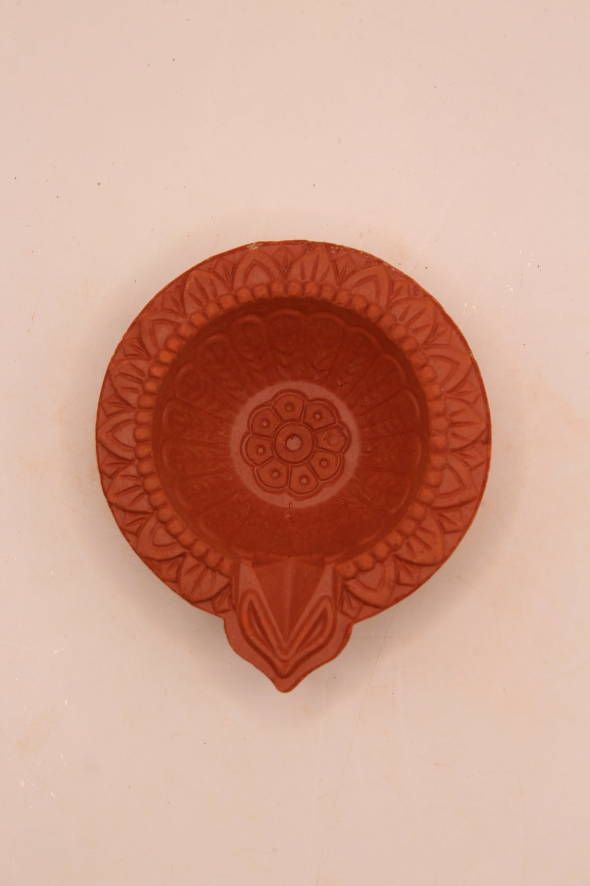 One Face Floral clay diya, back