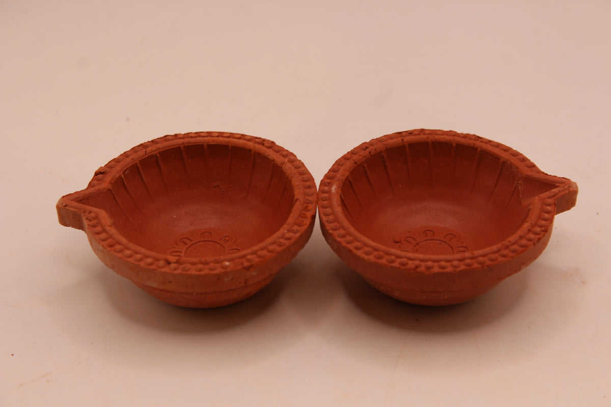 One Face Lined clay diya, back