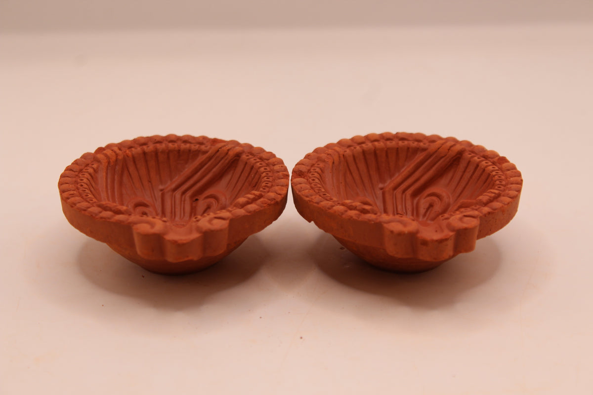 One Face Sathiya clay diya, front