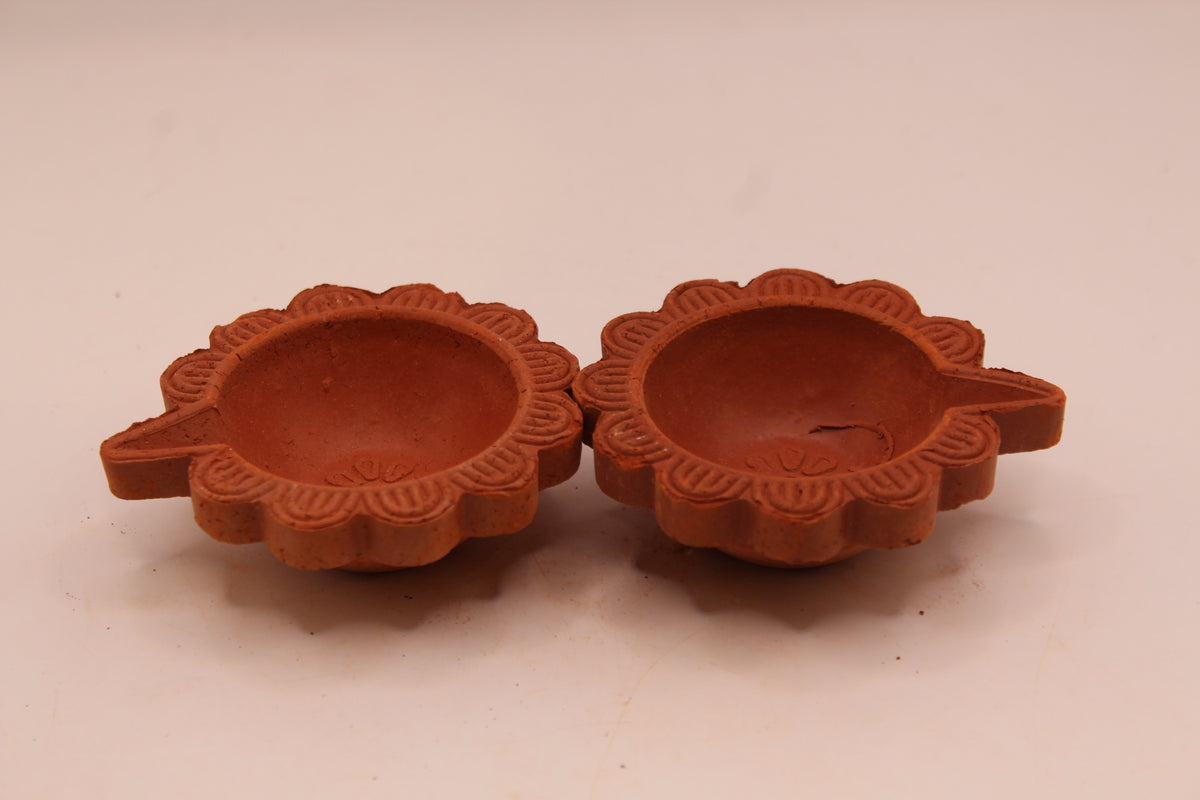 One Face Scalloped Edge clay diya, left
