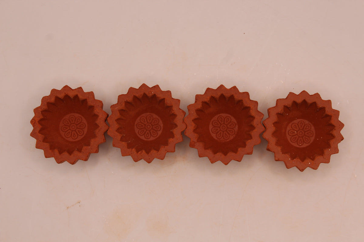 Zigzag Edge with Flower clay diya, above