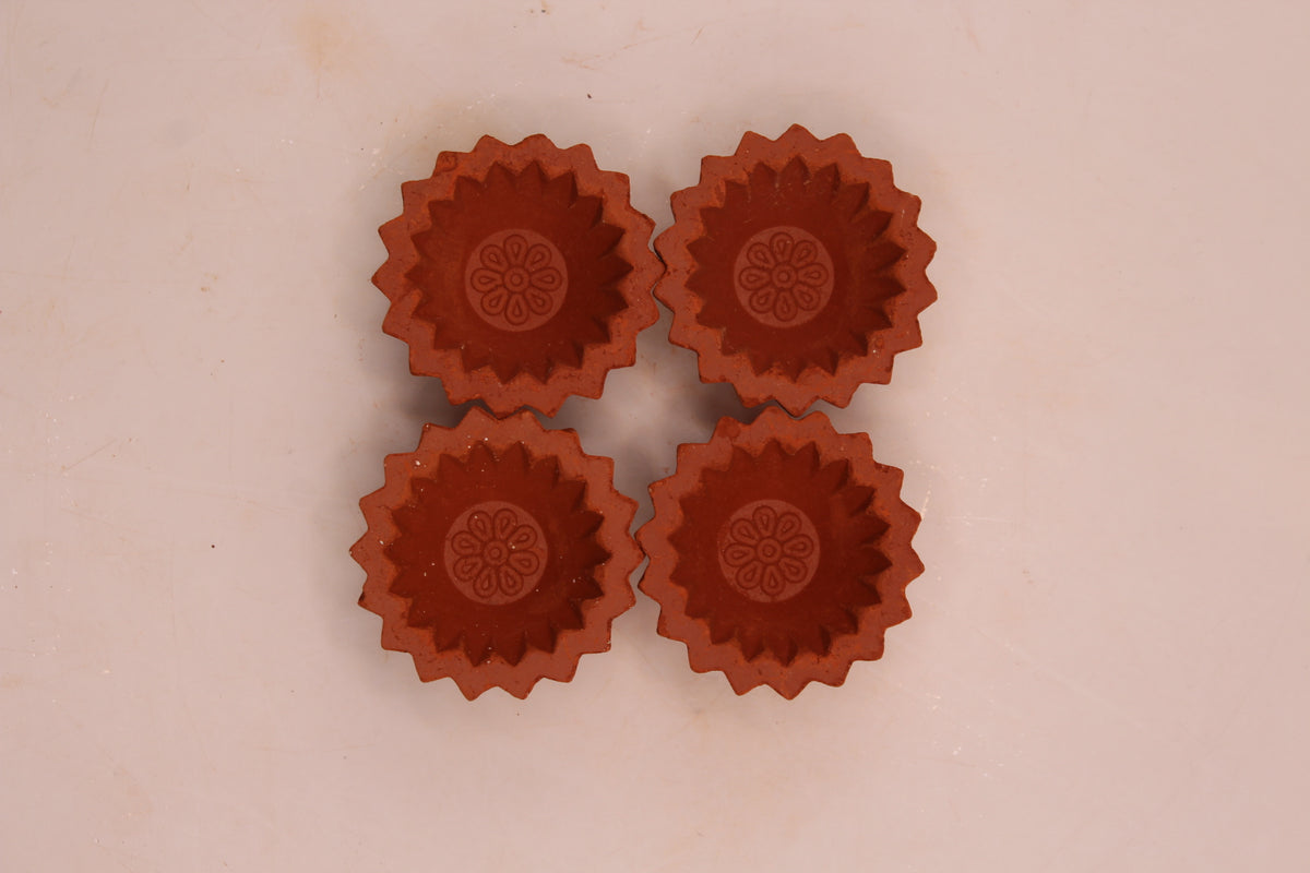 Zigzag Edge with Flower clay diya, right