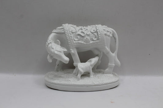 Small white resin cow and calf statue, front view