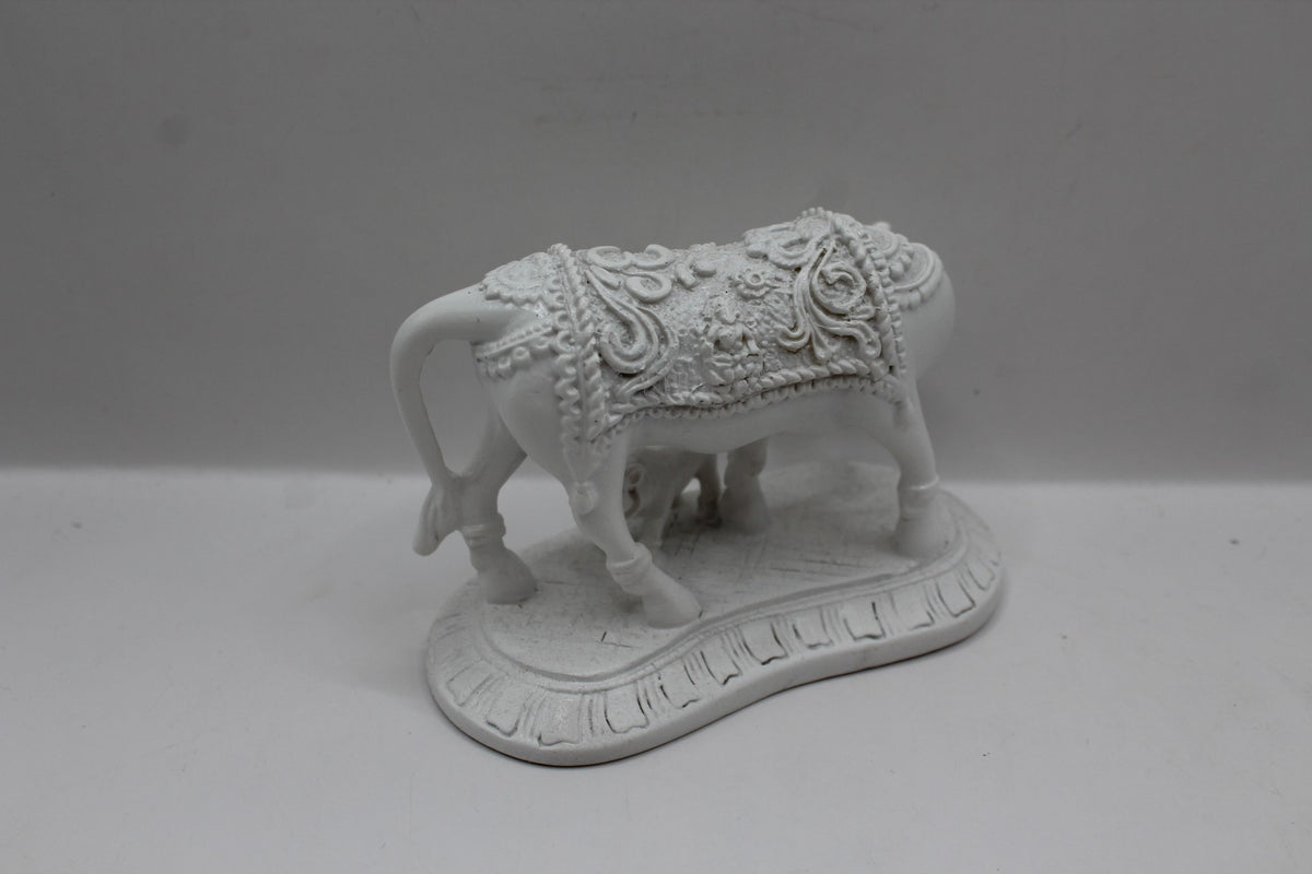 White resin cow and calf statue, back view