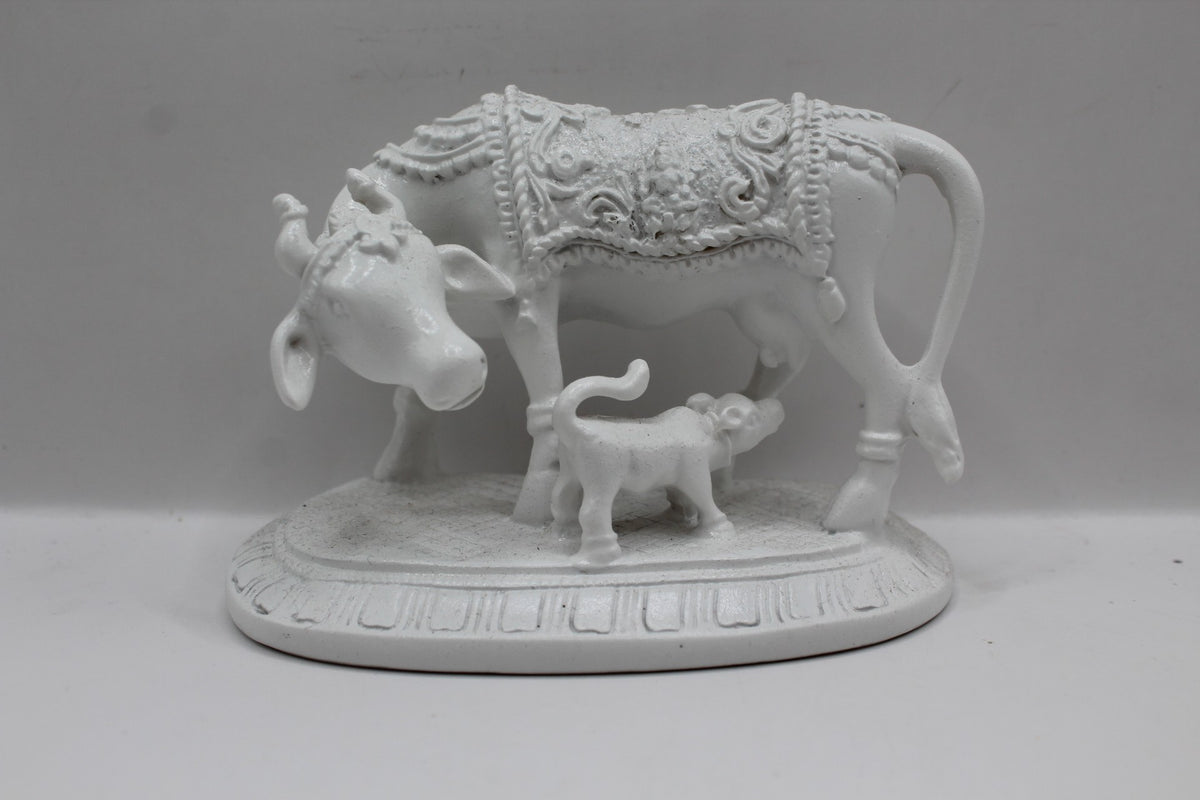 White resin cow and calf statue, front view