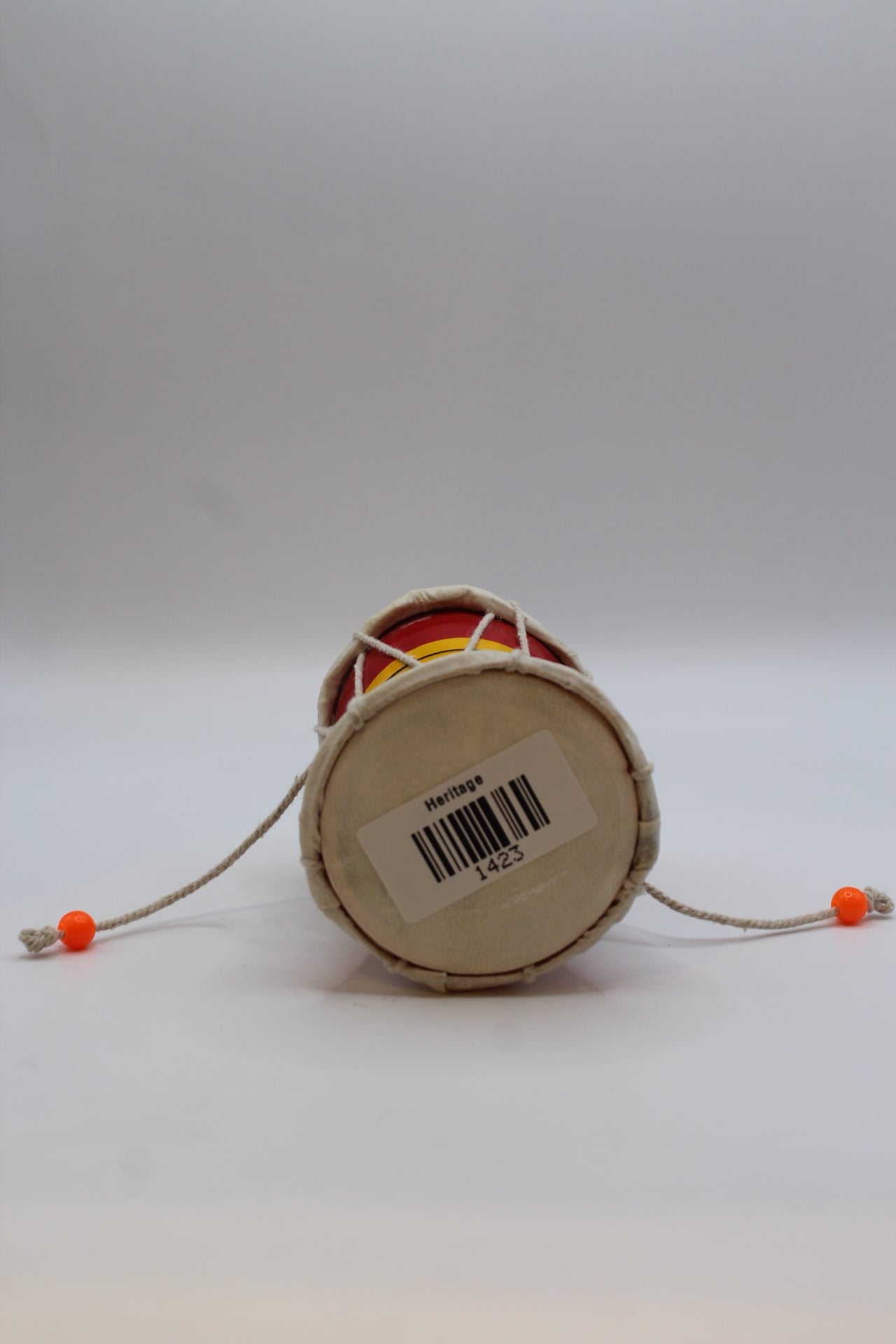 Medium damaru 10 x 8 inch — barcode label