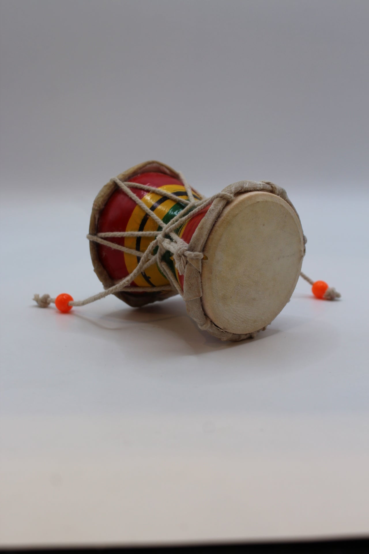 Small damaru 8 x 7 inch — front