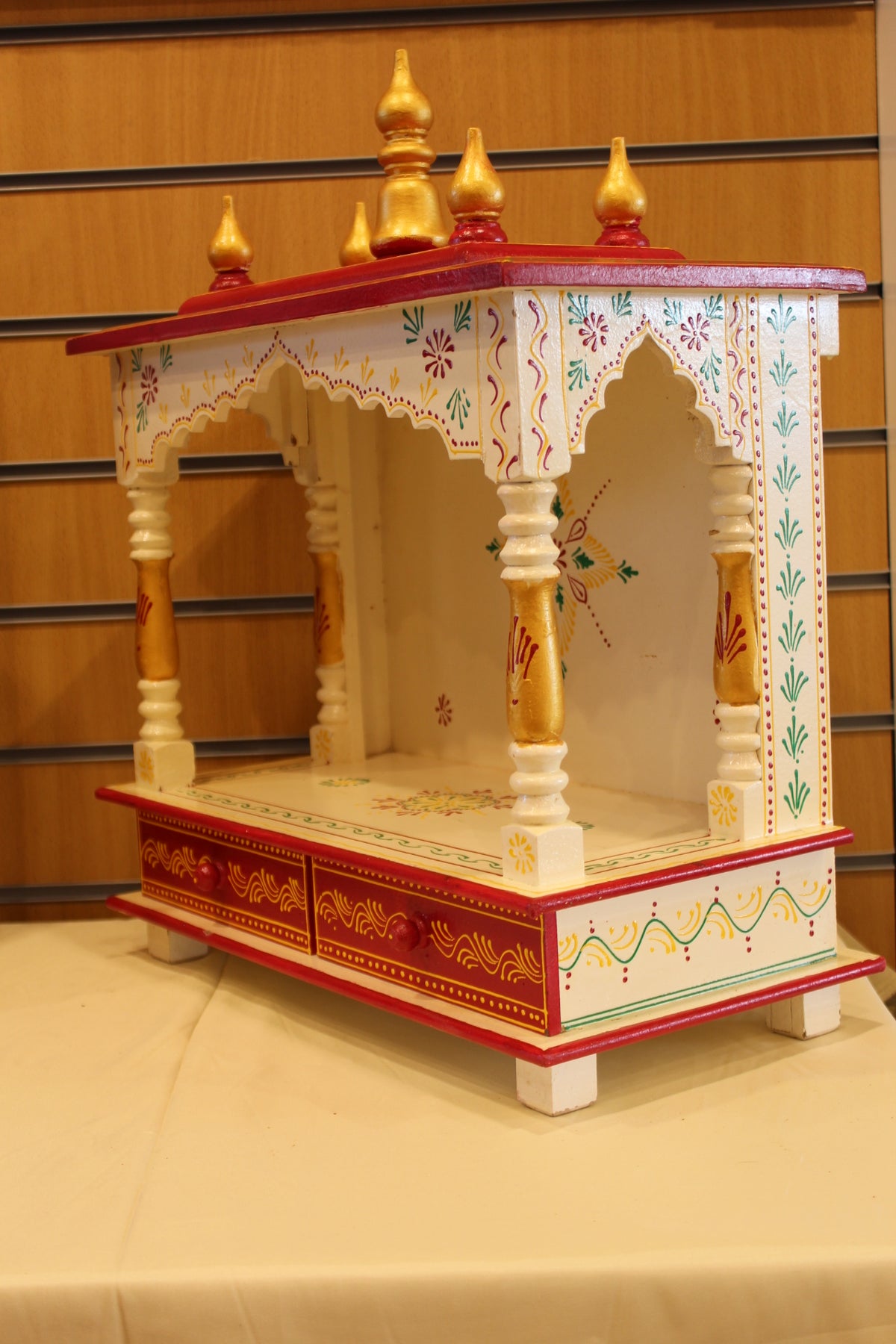 Open Front Jaipuri Mandir in white & red, angled side view from the other side