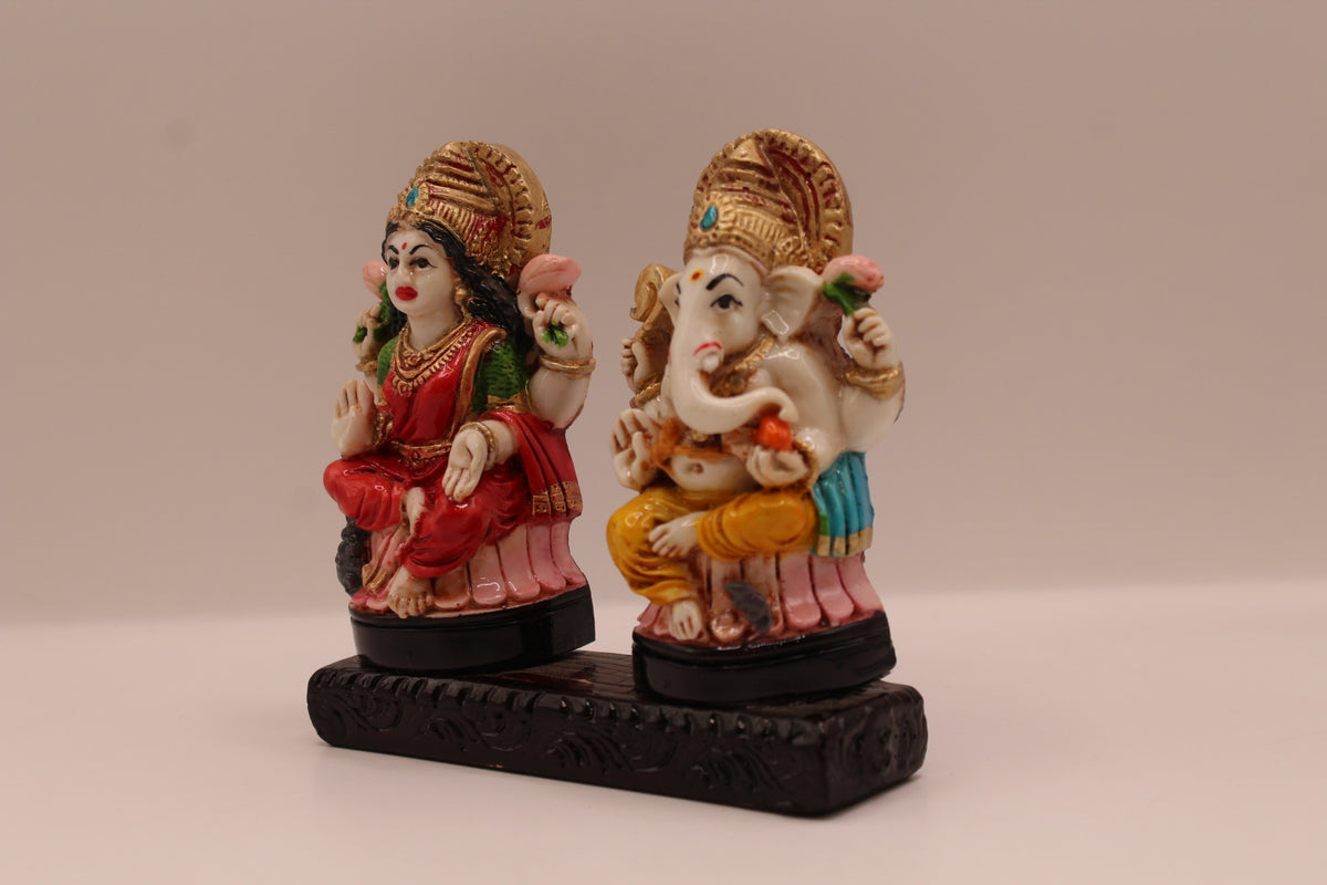 Ganesh Laxmi resin murti pair, right side