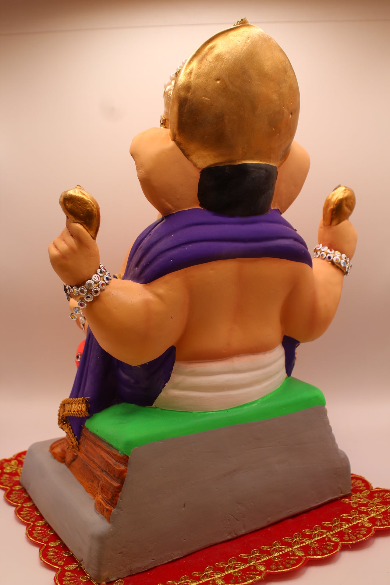 Eco-Friendly Ganesh Visarjan idol, Jewellery Style Purple Khes & Orange Dhoti, back view