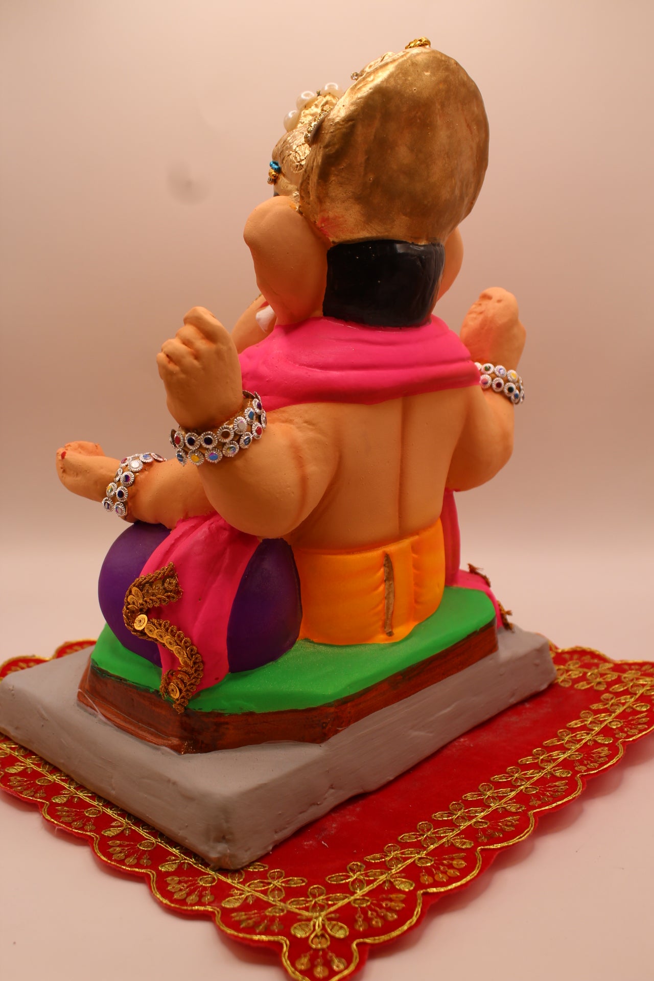 Eco-Friendly Ganesh Visarjan idol, Jewellery Style Pink Khes & Saffron Dhoti, back view