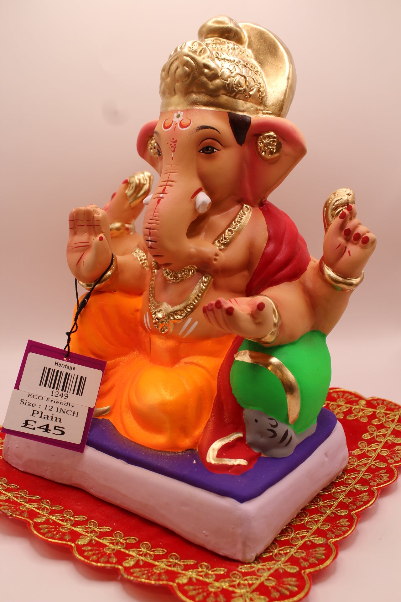 Eco-Friendly Ganesh Visarjan idol, Crimson Khes & Orange Dhoti, Gold Ear Medallions, close-up