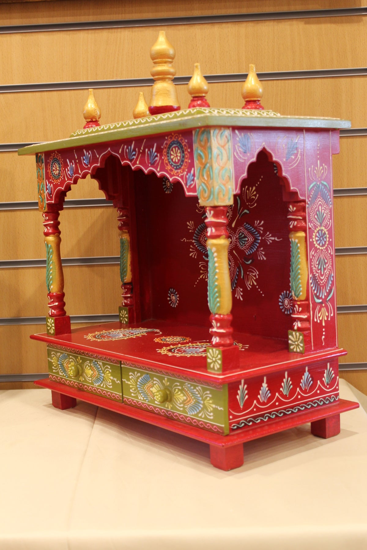 Open Front Jaipuri Mandir in red & green, angled side view from the other side