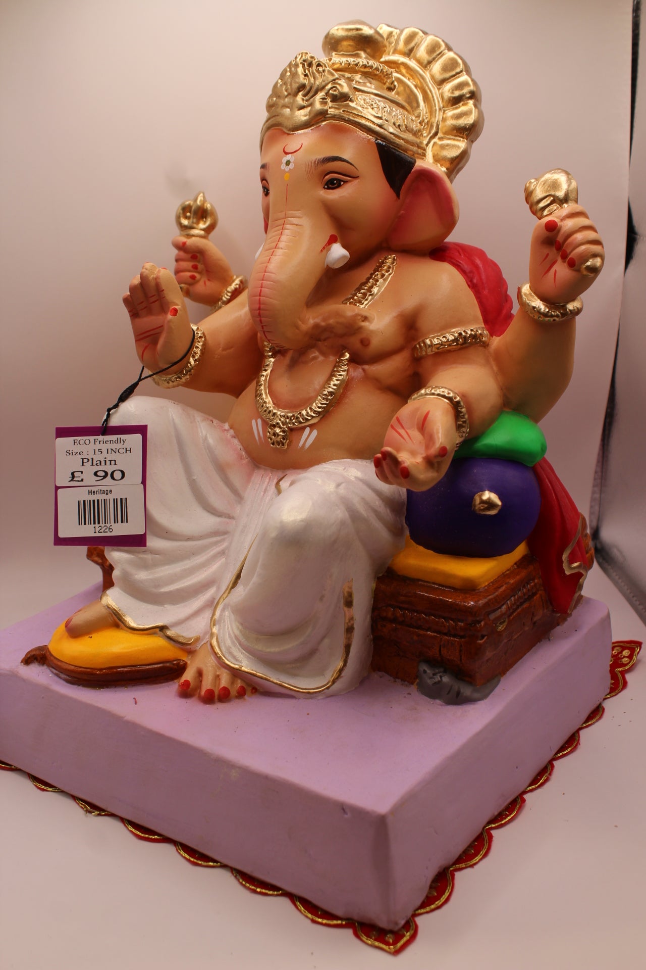 Eco-Friendly Ganesh Visarjan idol, Red Khes & White Dhoti, Modak Offerings, close-up