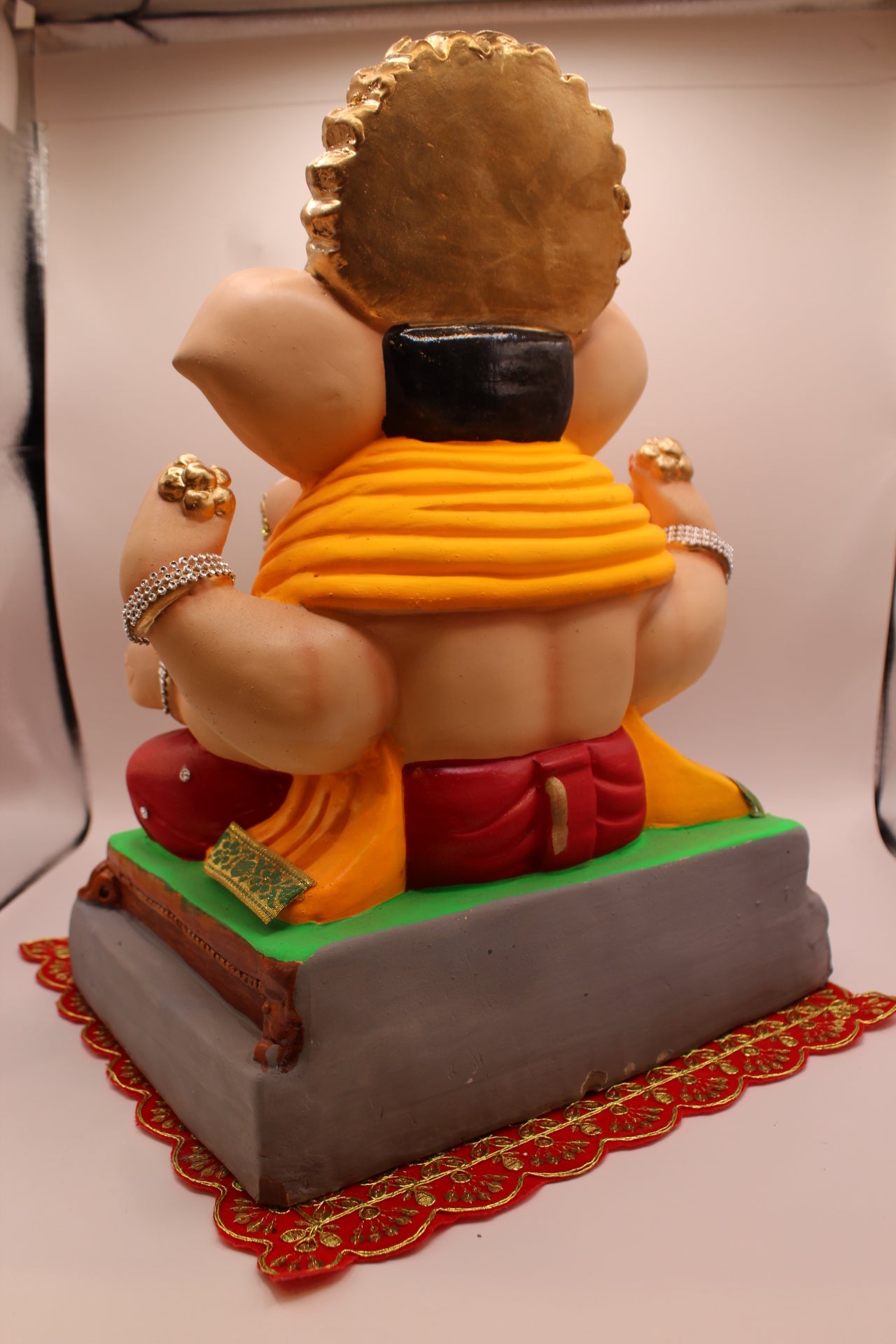 Eco-Friendly Ganesh Visarjan idol, Jewellery Style Saffron Dhoti & Ruby Bolsters, back view