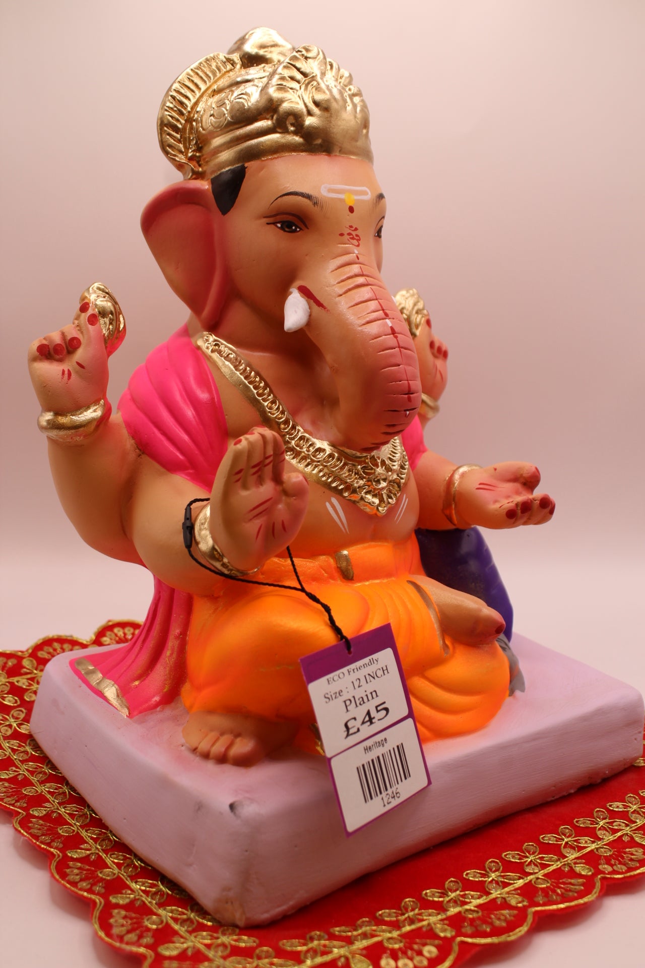 Eco-Friendly Ganesh Visarjan idol, Pink Khes & Orange Dhoti, Purple Bolster, close-up