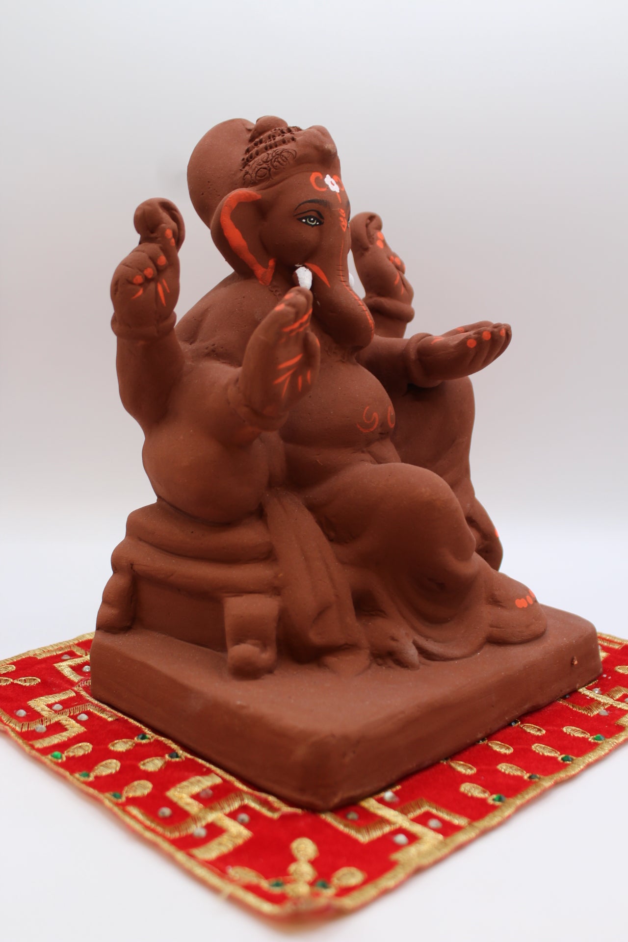 Natural terracotta eco-friendly 8 inch Ganesh Visarjan idol – side view