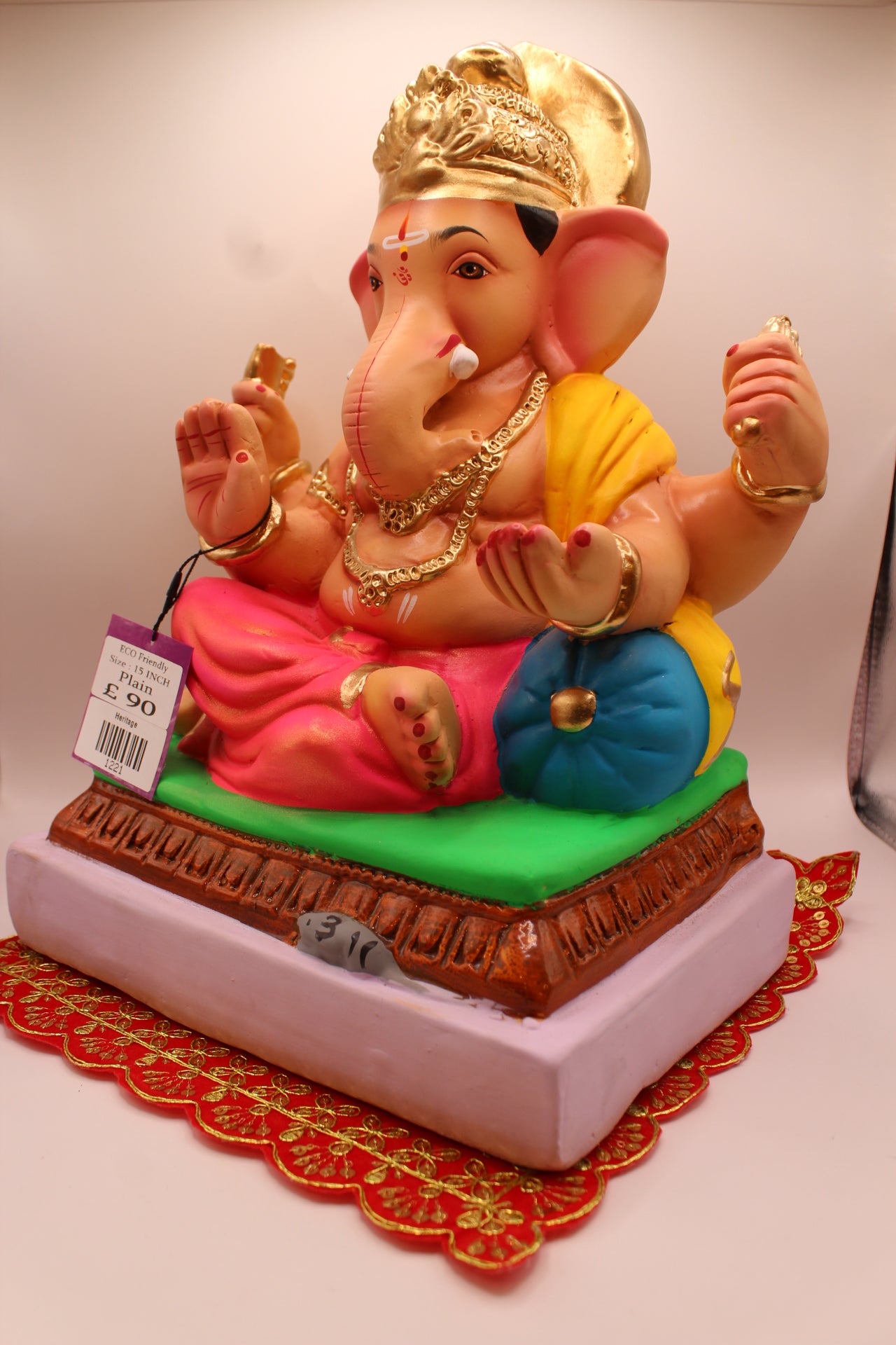 Eco-Friendly Ganesh Visarjan idol, Yellow Khes & Pink Dhoti, Turquoise Bolster, close-up
