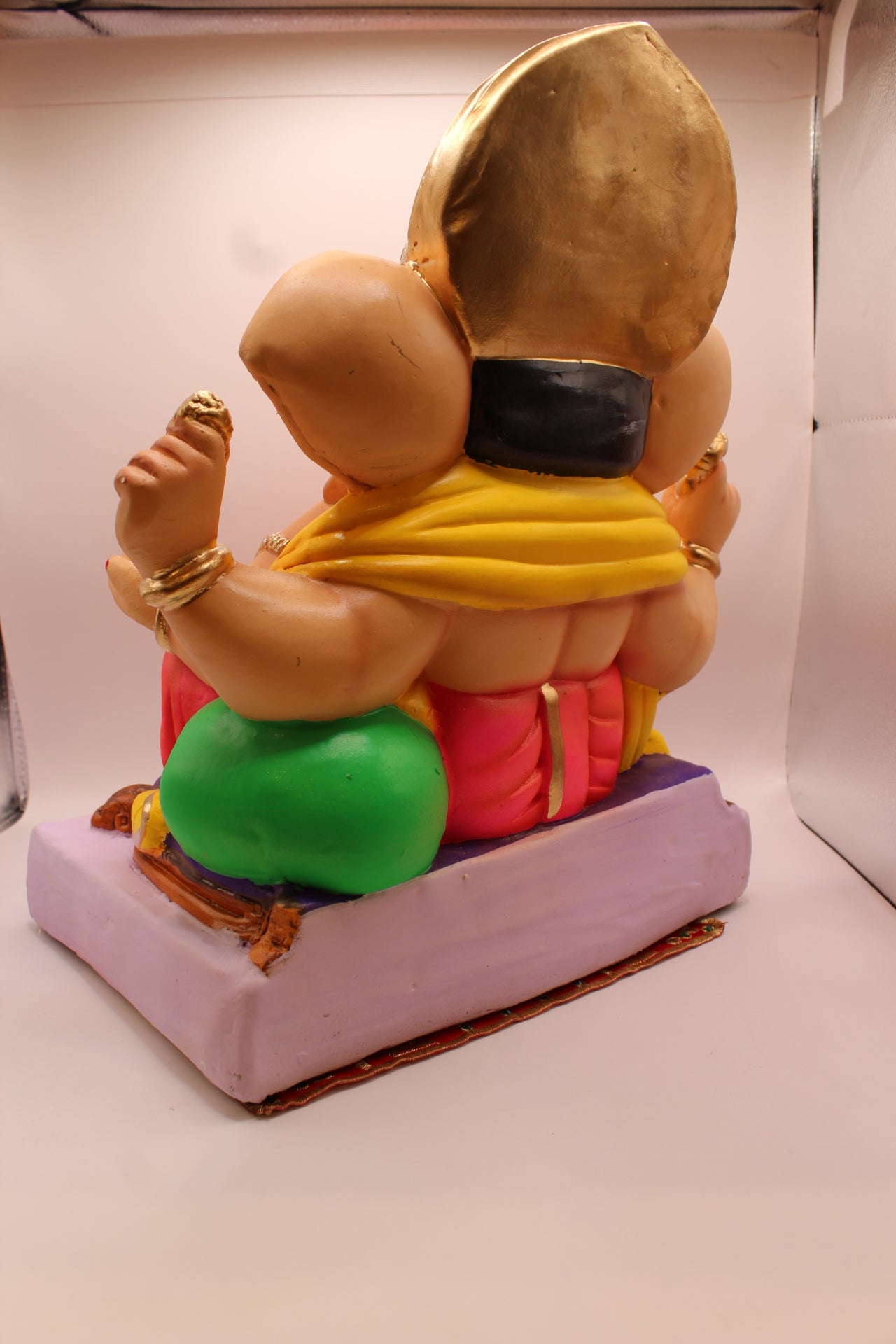 Eco-Friendly Ganesh Visarjan idol, Yellow Khes & Pink Dhoti, Green Modak Cushion, back view