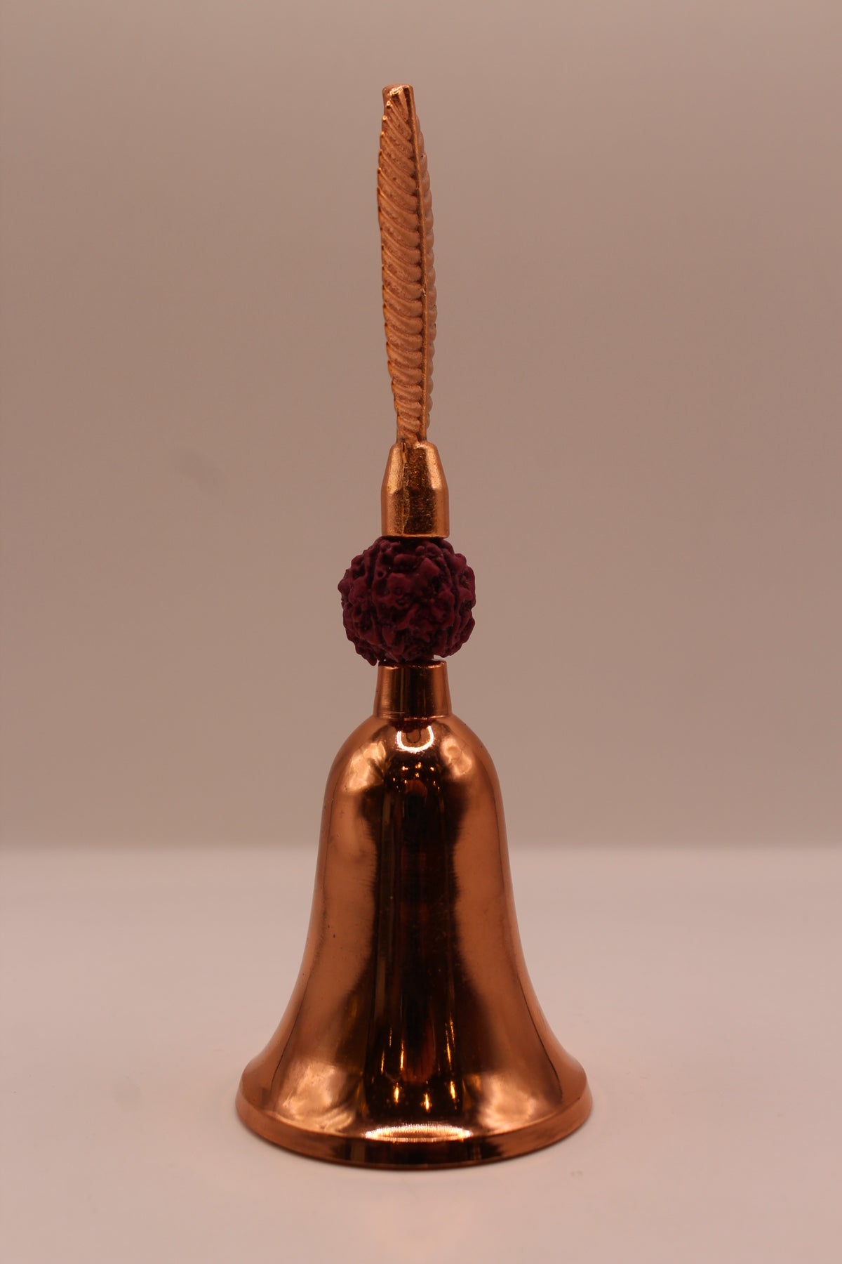 Rudraksha pooja bell, rose gold, left side