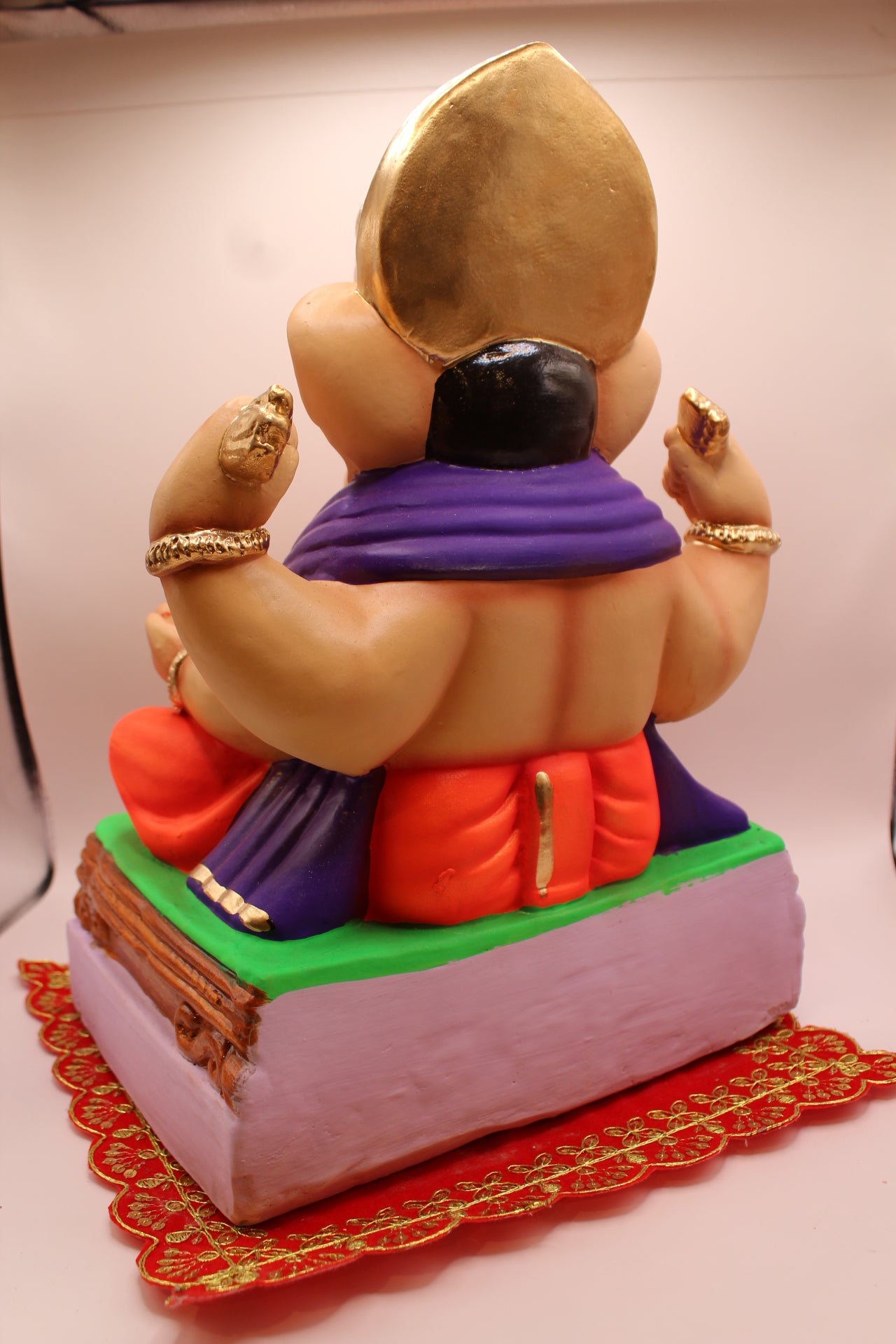 Eco-Friendly Ganesh Visarjan idol, Purple Khes & Orange Dhoti, Gold Collar, back view