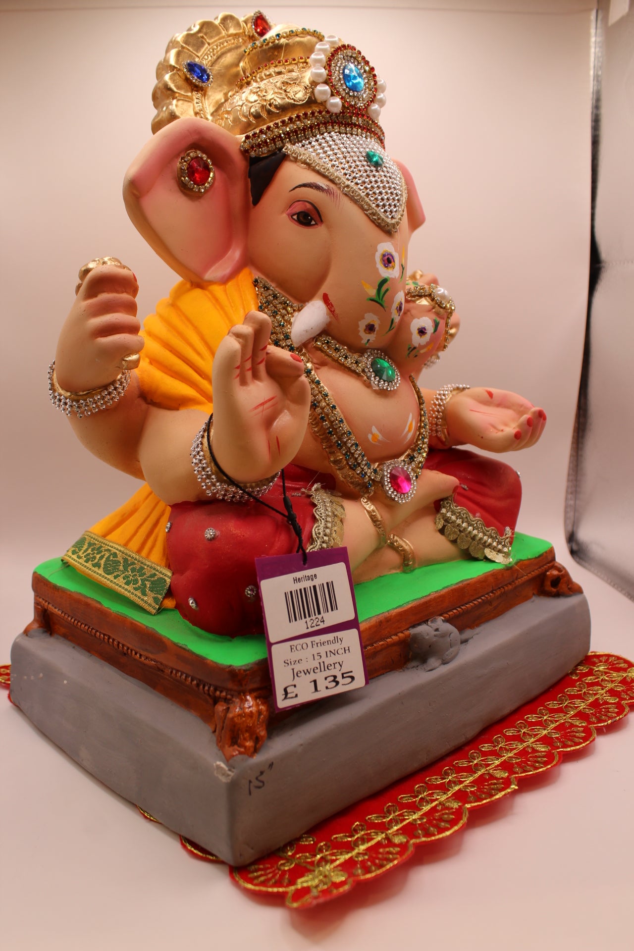 Eco-Friendly Ganesh Visarjan idol, Jewellery Style Saffron Dhoti & Ruby Bolsters, side view