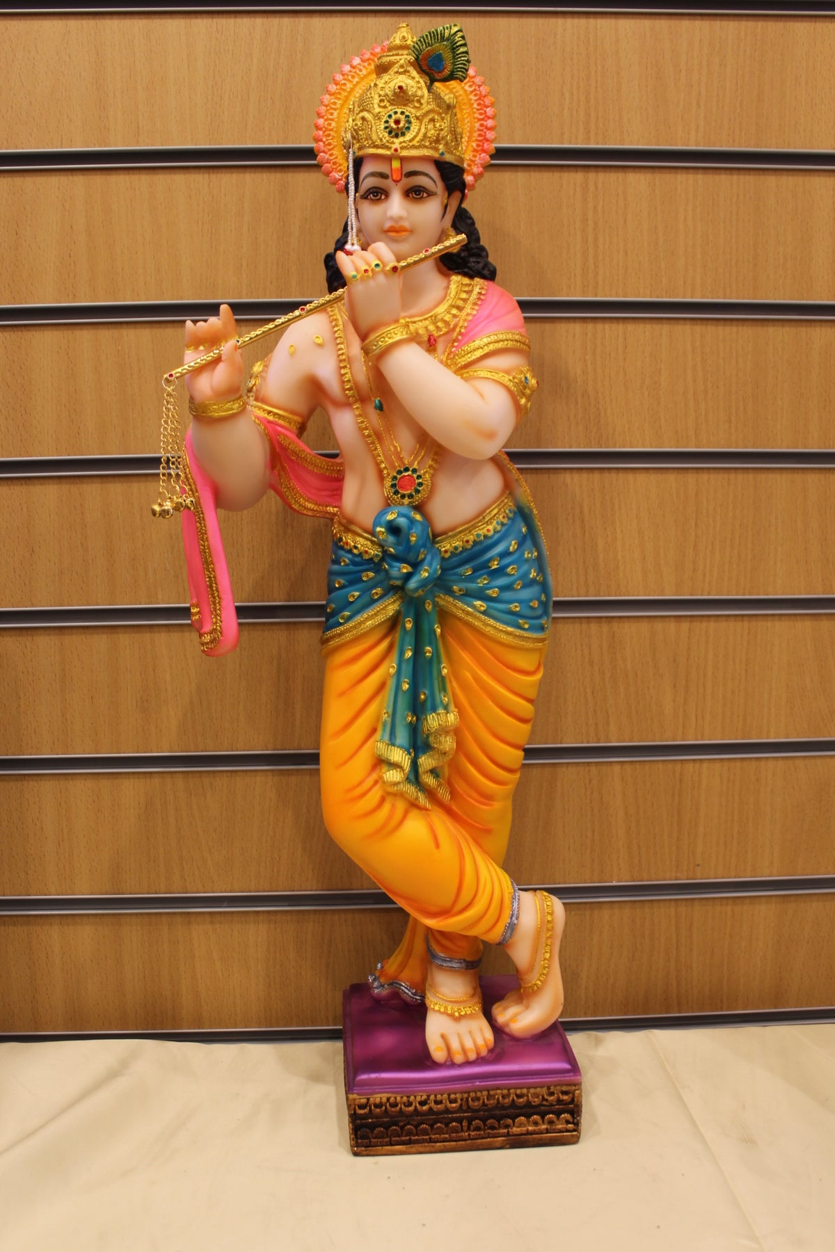 Resin/Fibre Krishna Statue for Home Temple – Playing Flute, 25 inch – Orange & Teal – front view