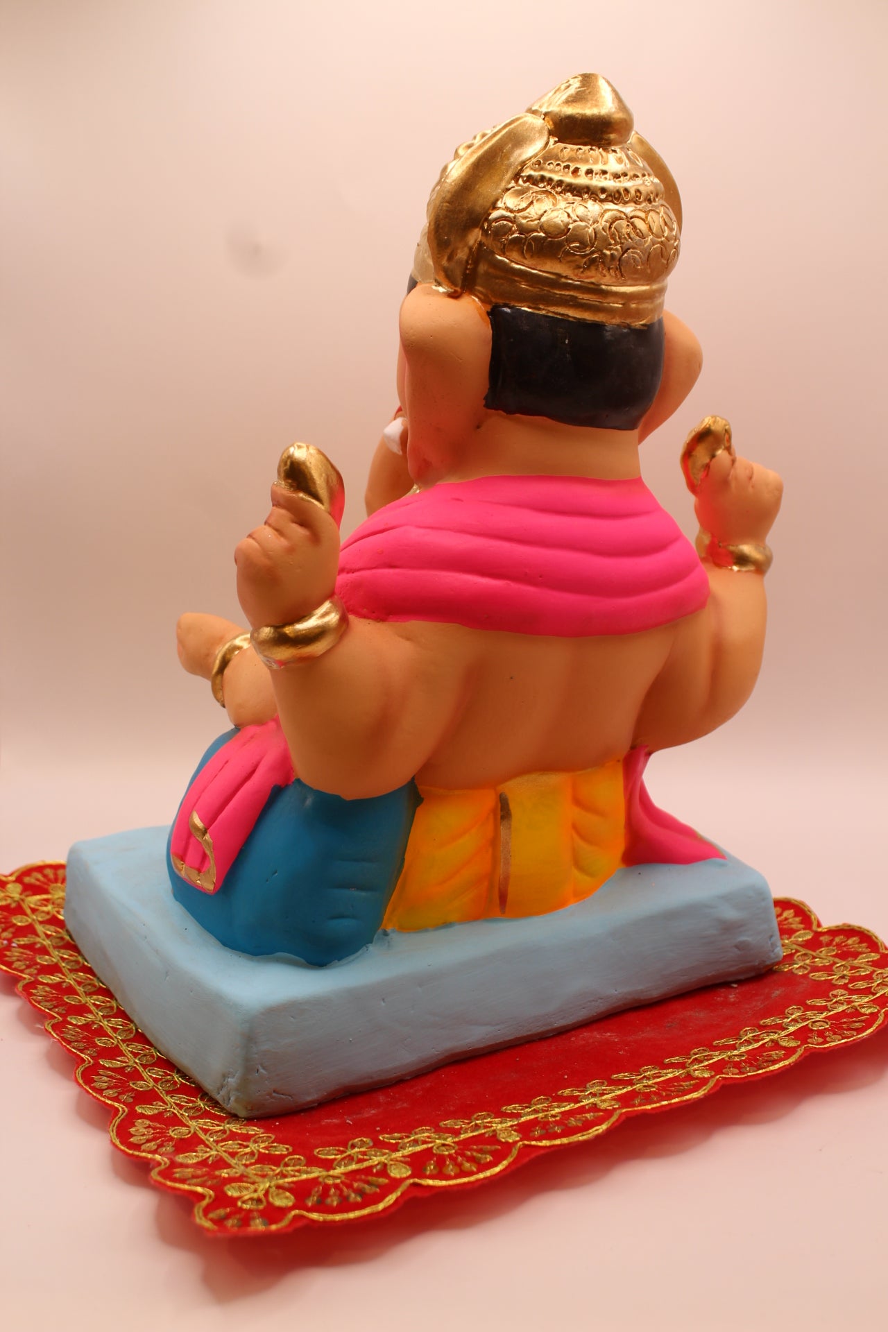 Eco-Friendly Ganesh Visarjan idol, Pink Khes & Yellow Dhoti, Blue Bolster, back view