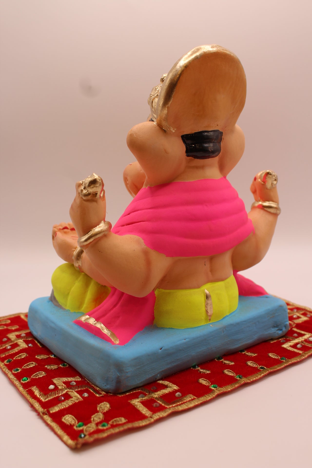 Eco-friendly 8 inch Ganesh Visarjan idol with gold halo crown – back view