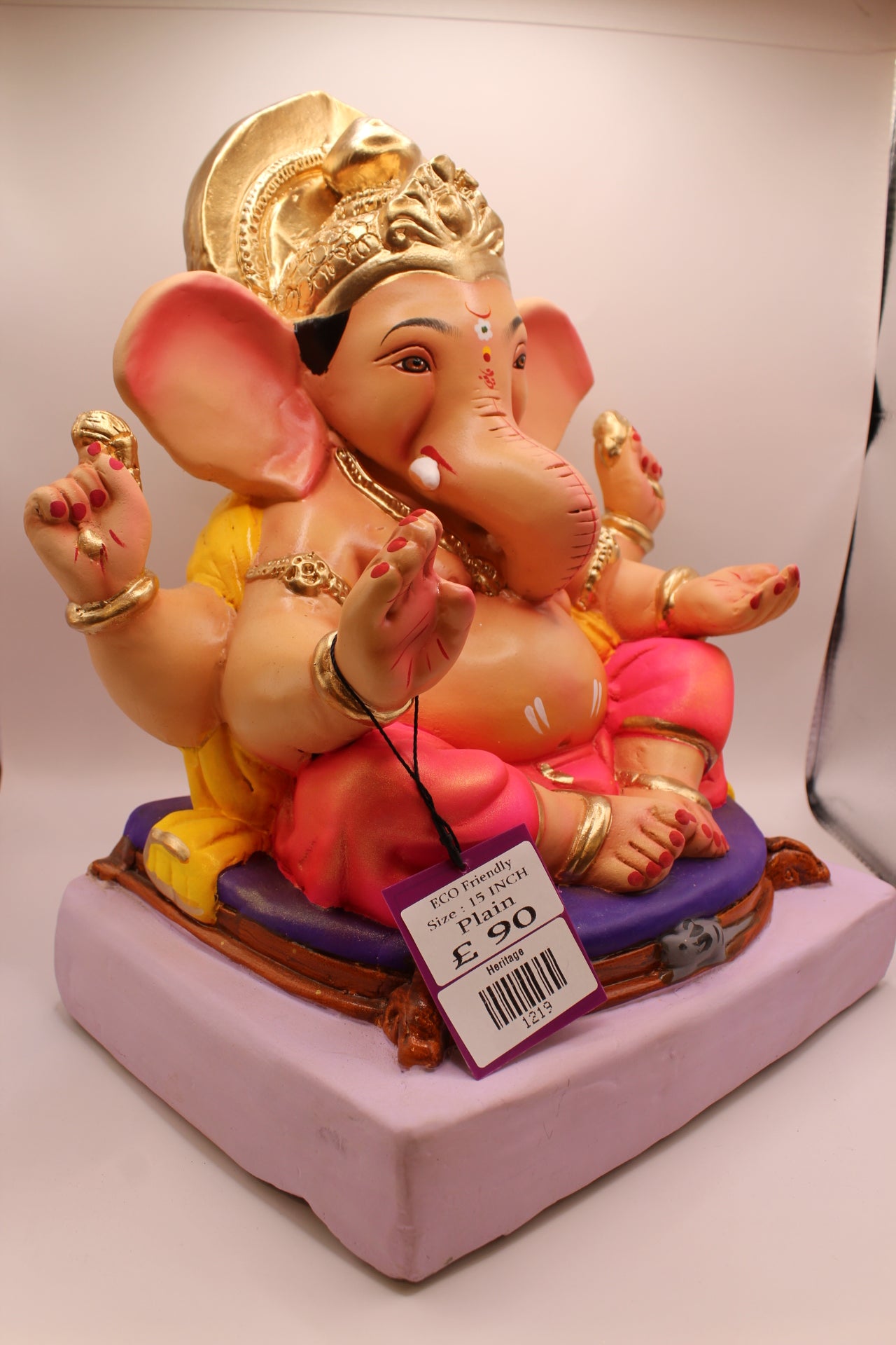 Eco-Friendly Ganesh Visarjan idol, Yellow Khes & Pink Dhoti, Green Modak Cushion, close-up