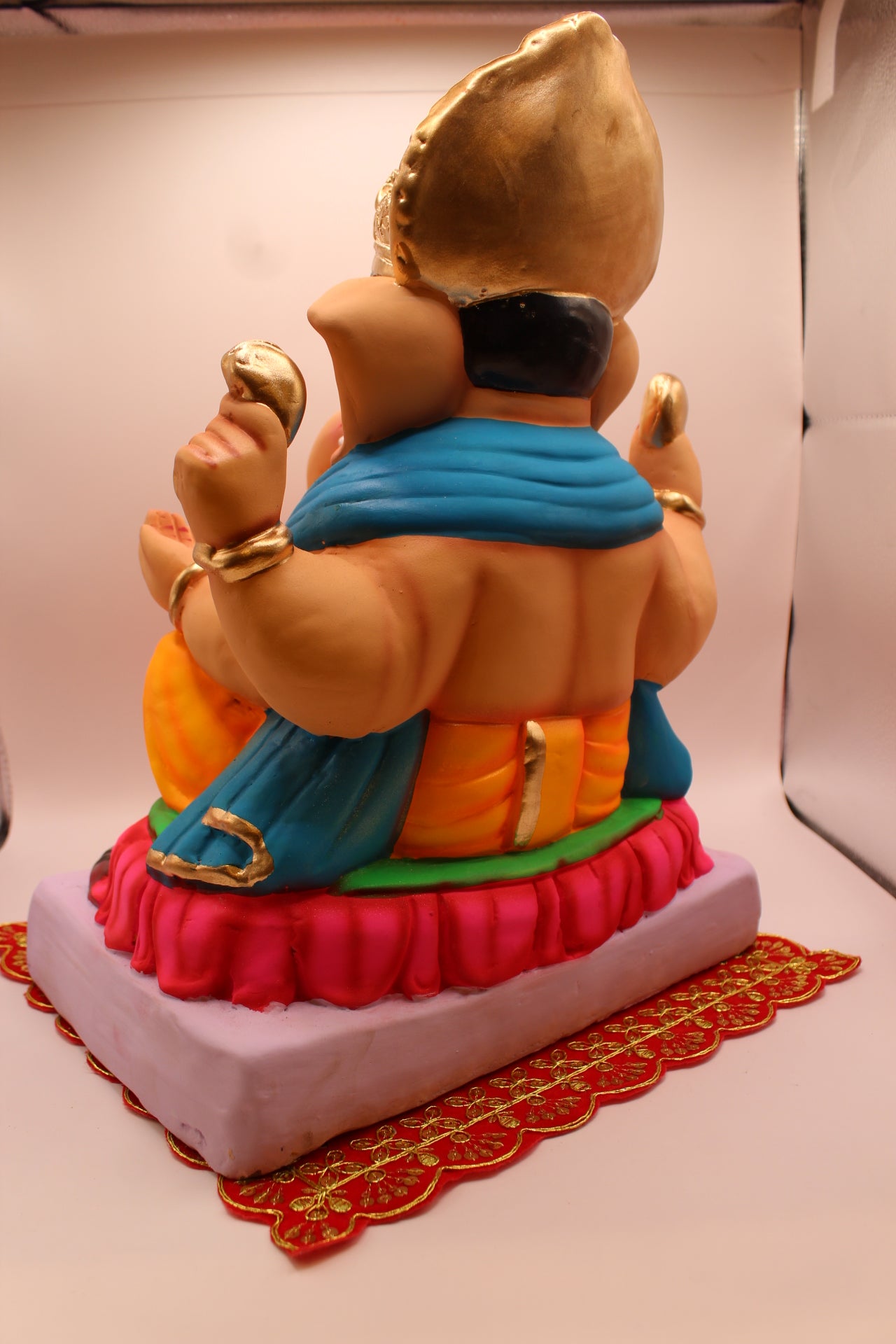 Eco-Friendly Ganesh Visarjan idol, Blue Khes & Orange Dhoti, Pink Lotus Base, back view