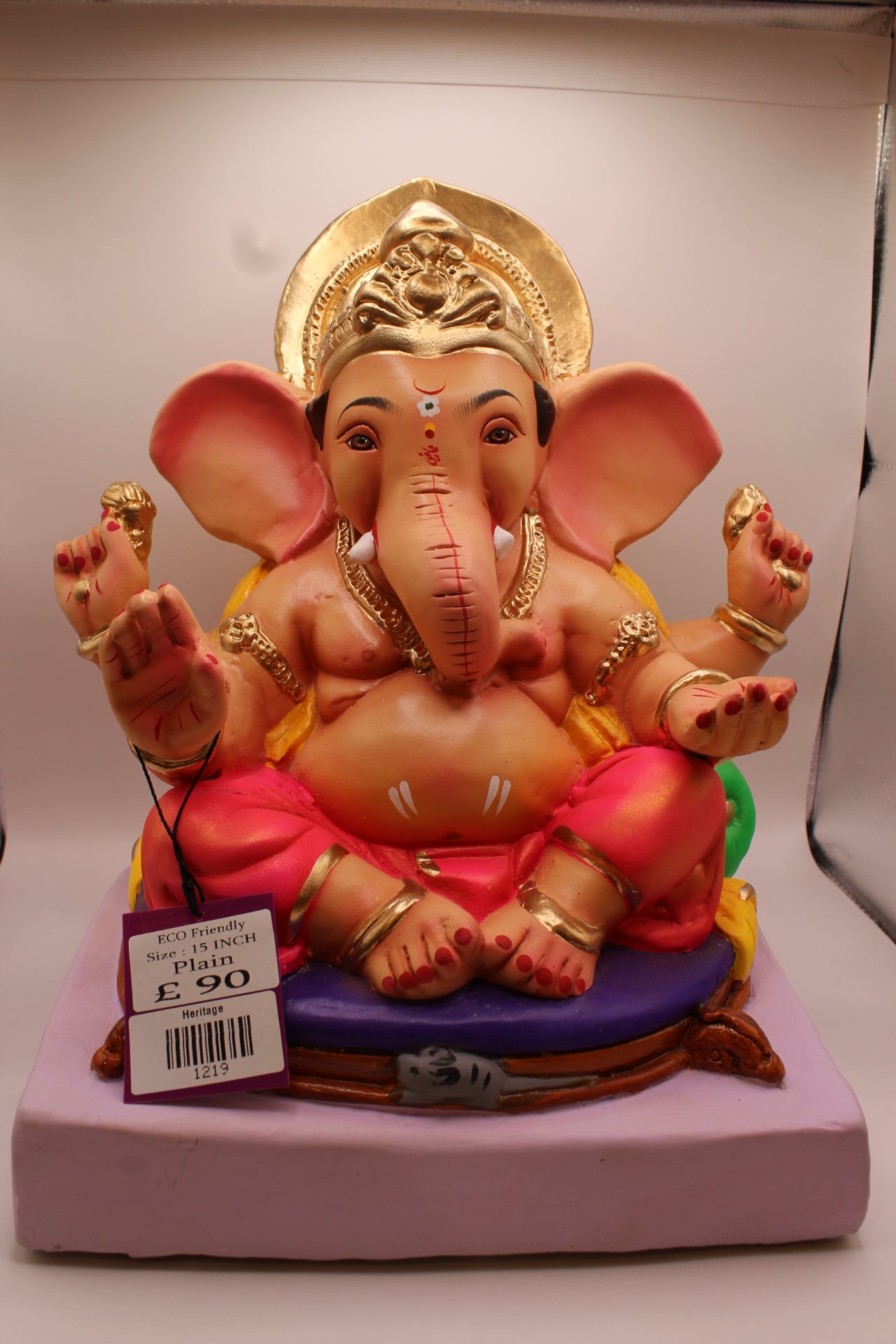 Eco-Friendly Ganesh Visarjan idol, Yellow Khes & Pink Dhoti, Green Modak Cushion, front view