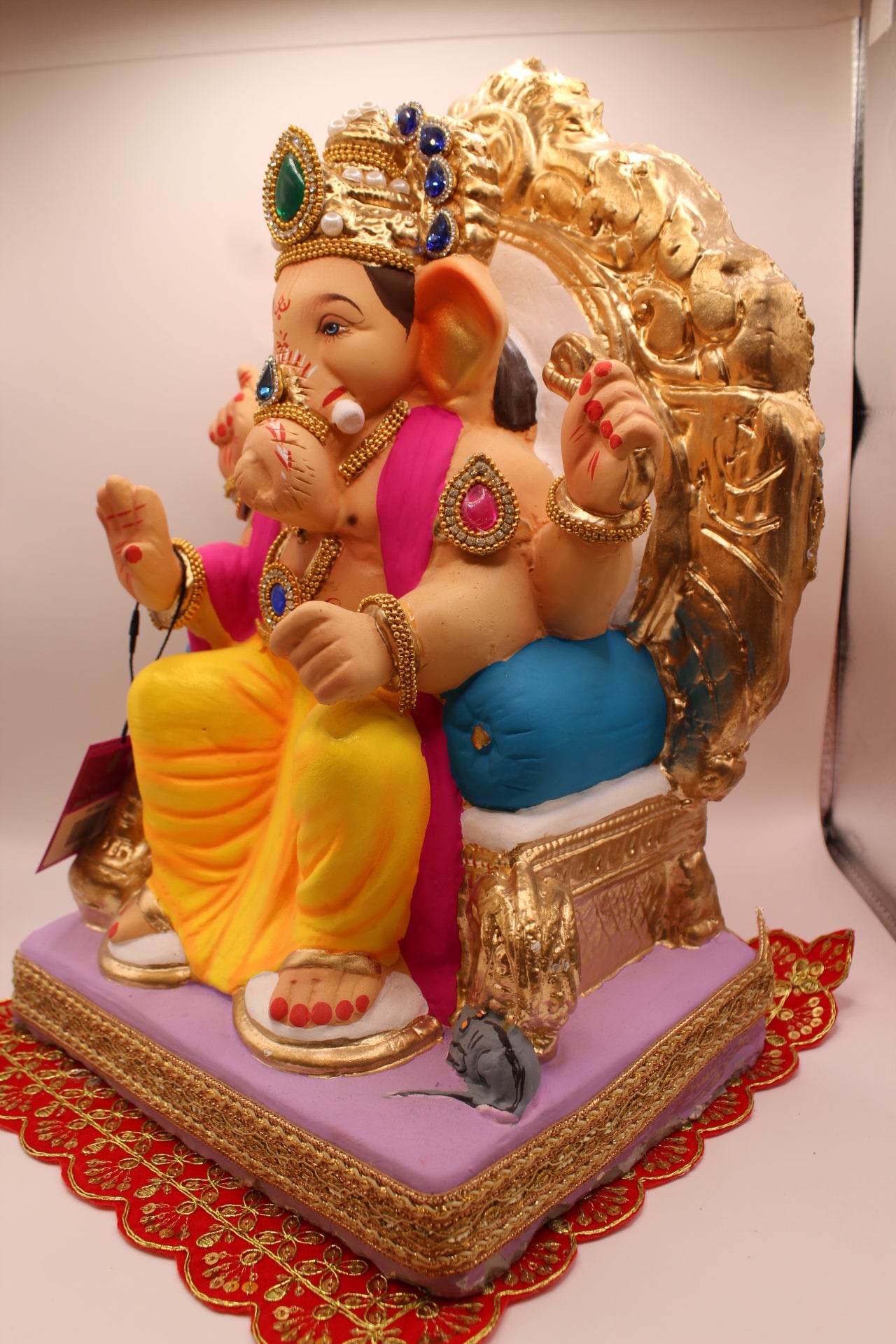 Eco-Friendly Ganesh Visarjan idol, Jewellery Style Pink Khes & Yellow Dhoti, Gold Prabhavali, close-up