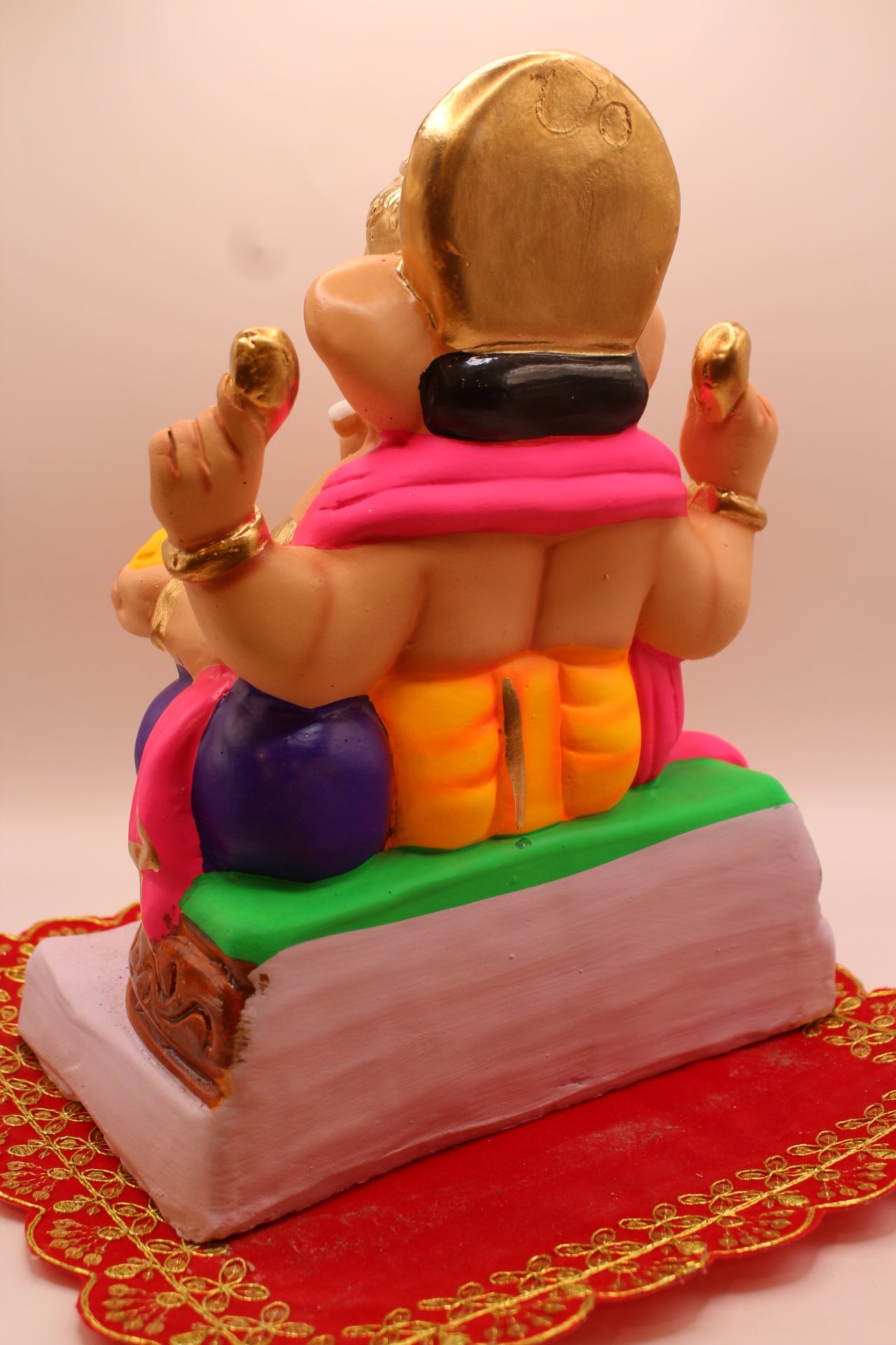 Eco-Friendly Ganesh Visarjan idol, Pink Khes & Saffron Dhoti, Carved Wooden Throne, back view