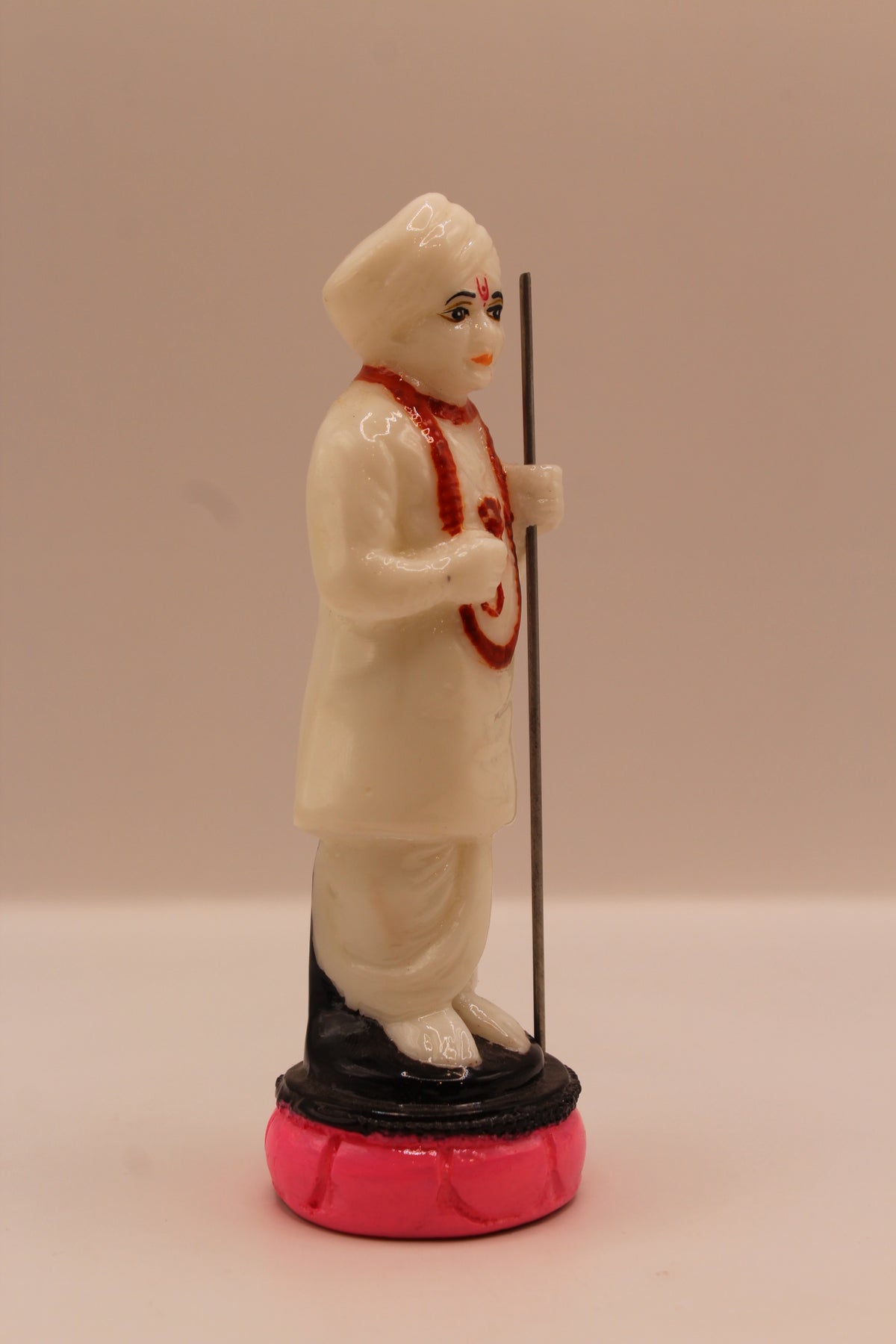 White Jalaram Bapa resin murti with red mala, front