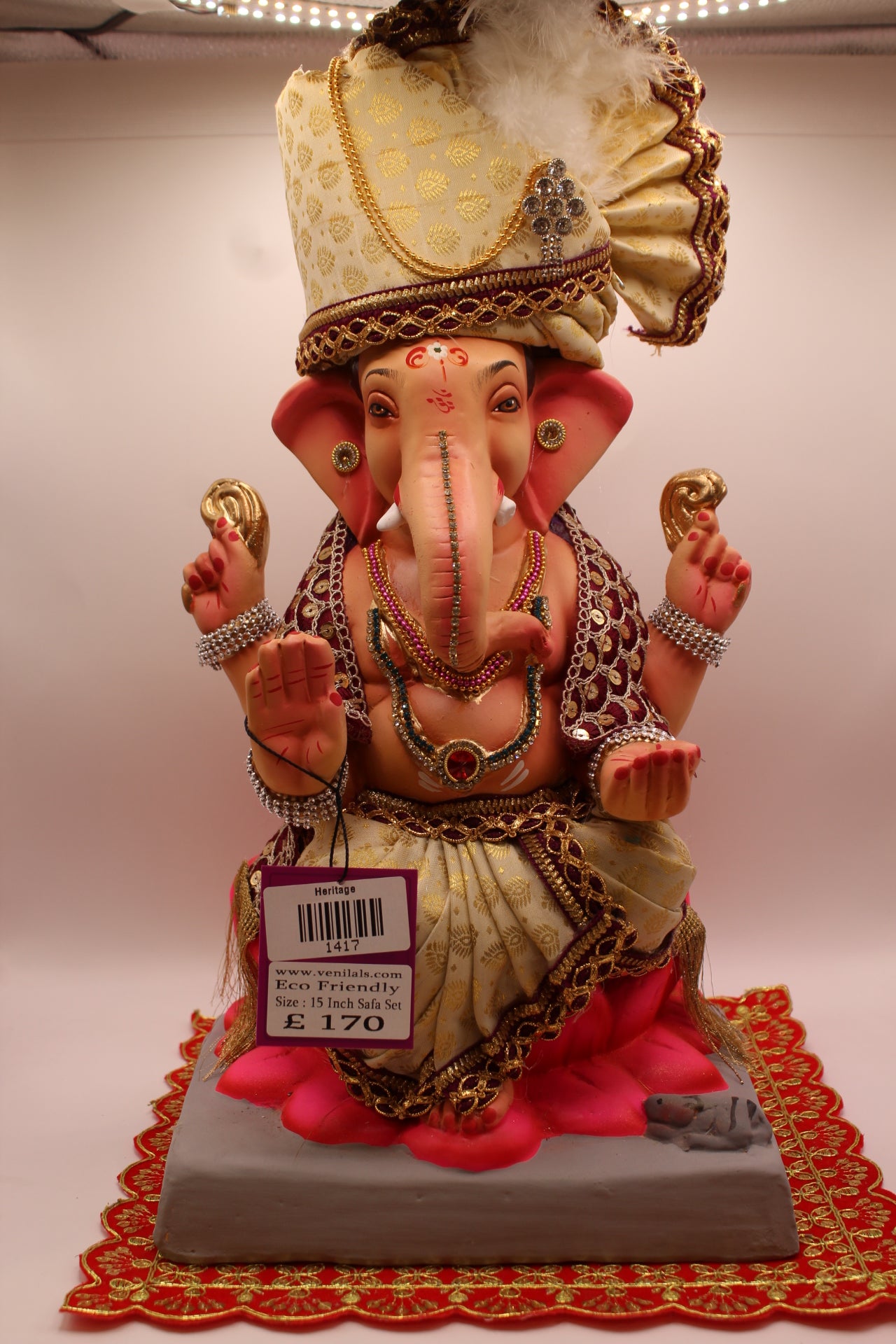 15 inch eco-friendly Ganesh idol – ivory gold safa set on hot pink lotus mat, front