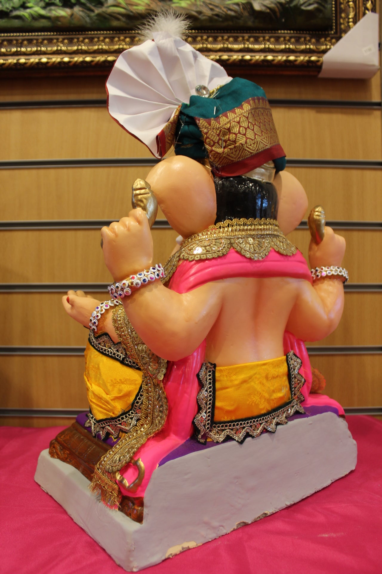 Back view – copper shot-silk safa with yellow silk dhoti