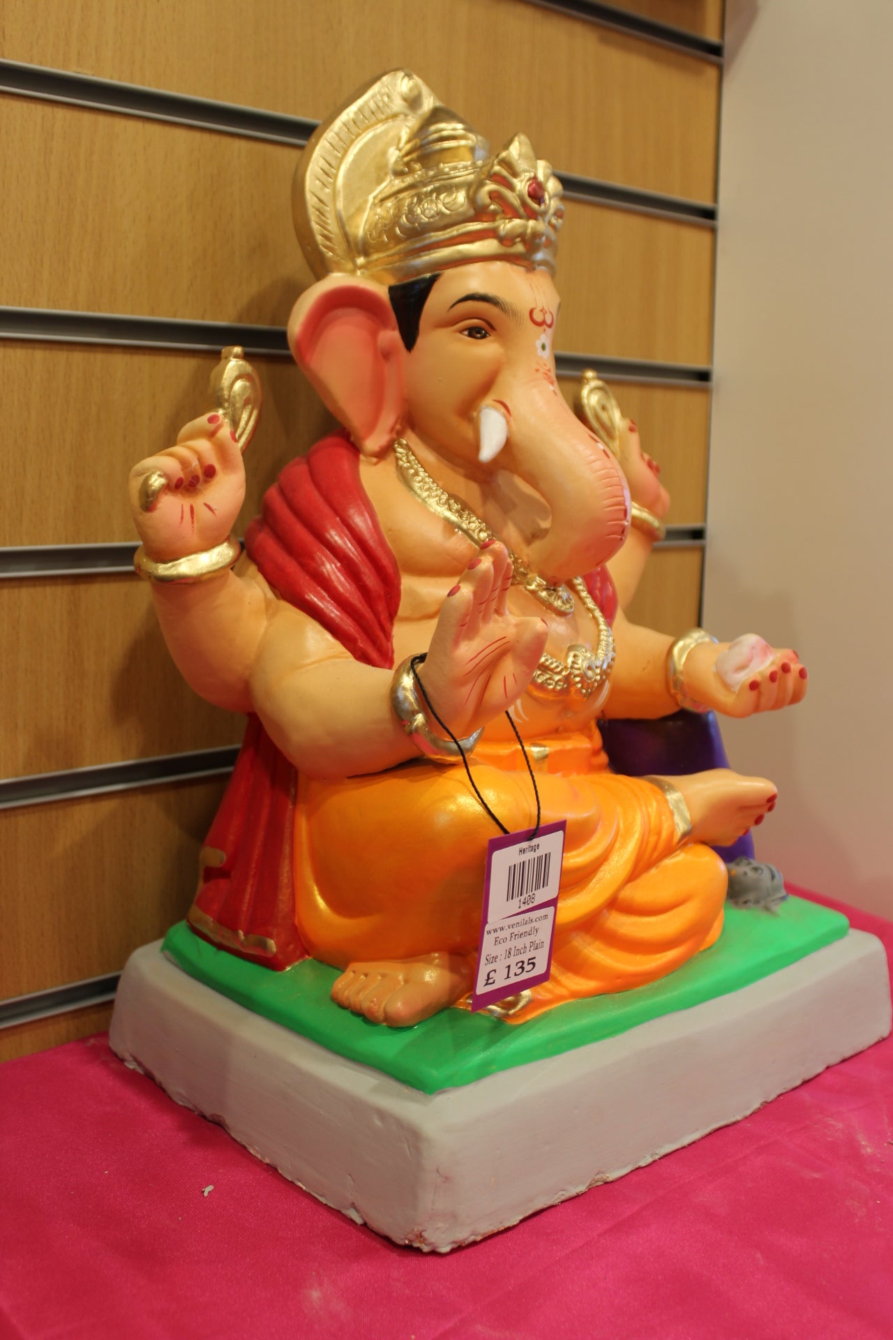 Side view – red khes and orange dhoti with purple bolster
