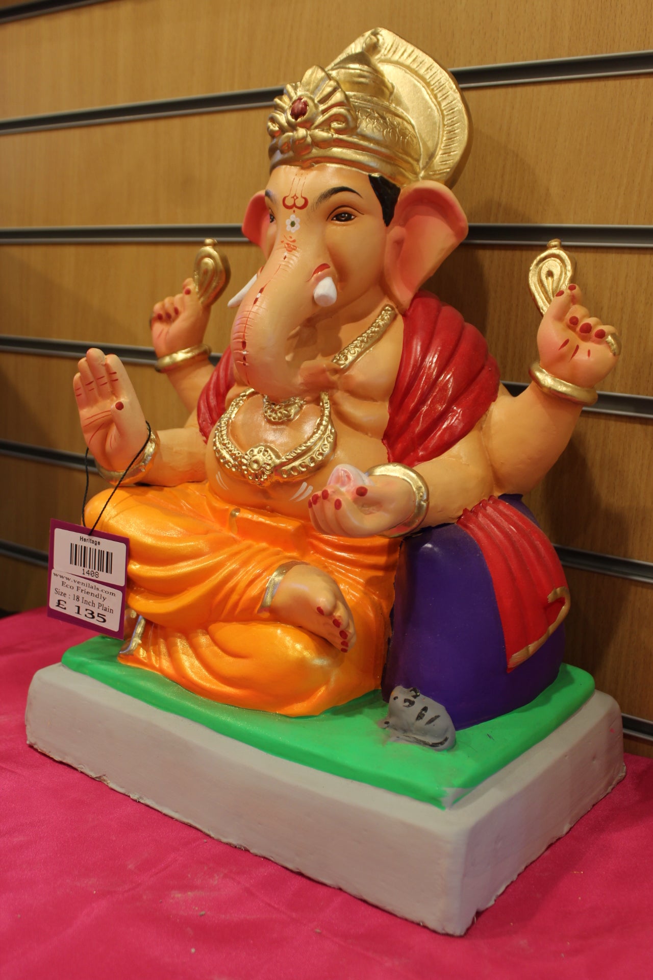 Angled view – red khes and orange dhoti with purple bolster