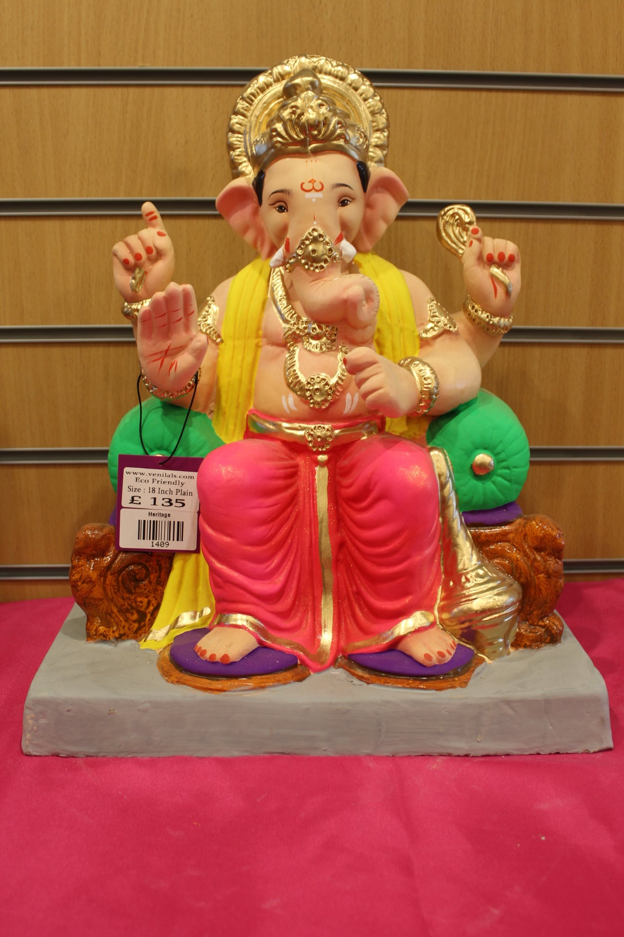 18 inch eco-friendly Ganesh idol – yellow khes and rani pink dhoti on scroll-legged chowki, front