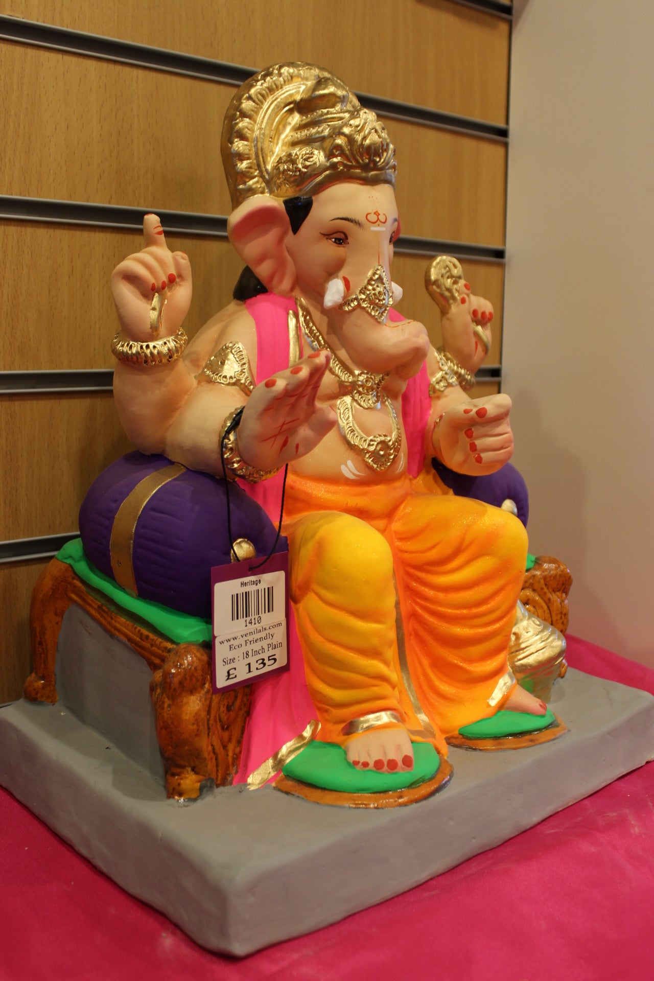 Side view – pink khes and orange dhoti with purple bolster
