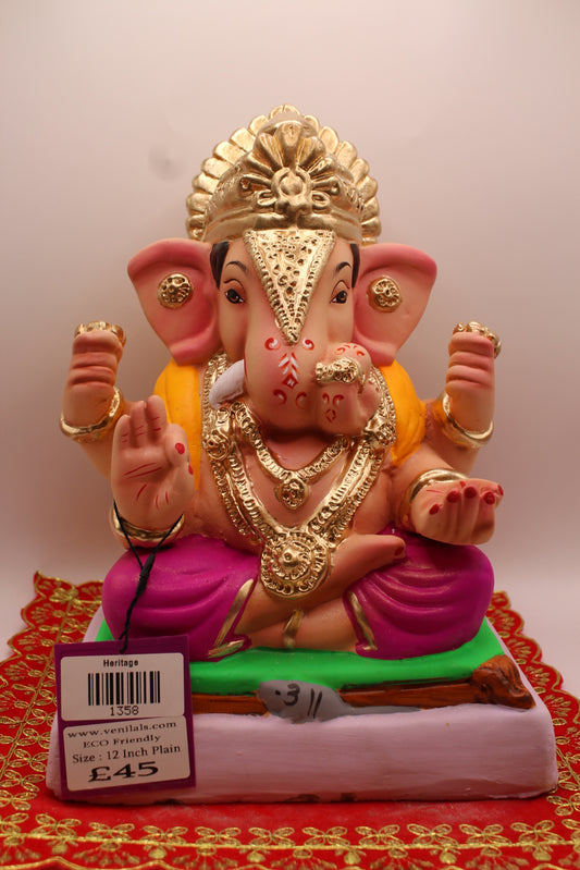 12 inch eco-friendly Ganesh idol, rani pink dhoti and marigold khes, front