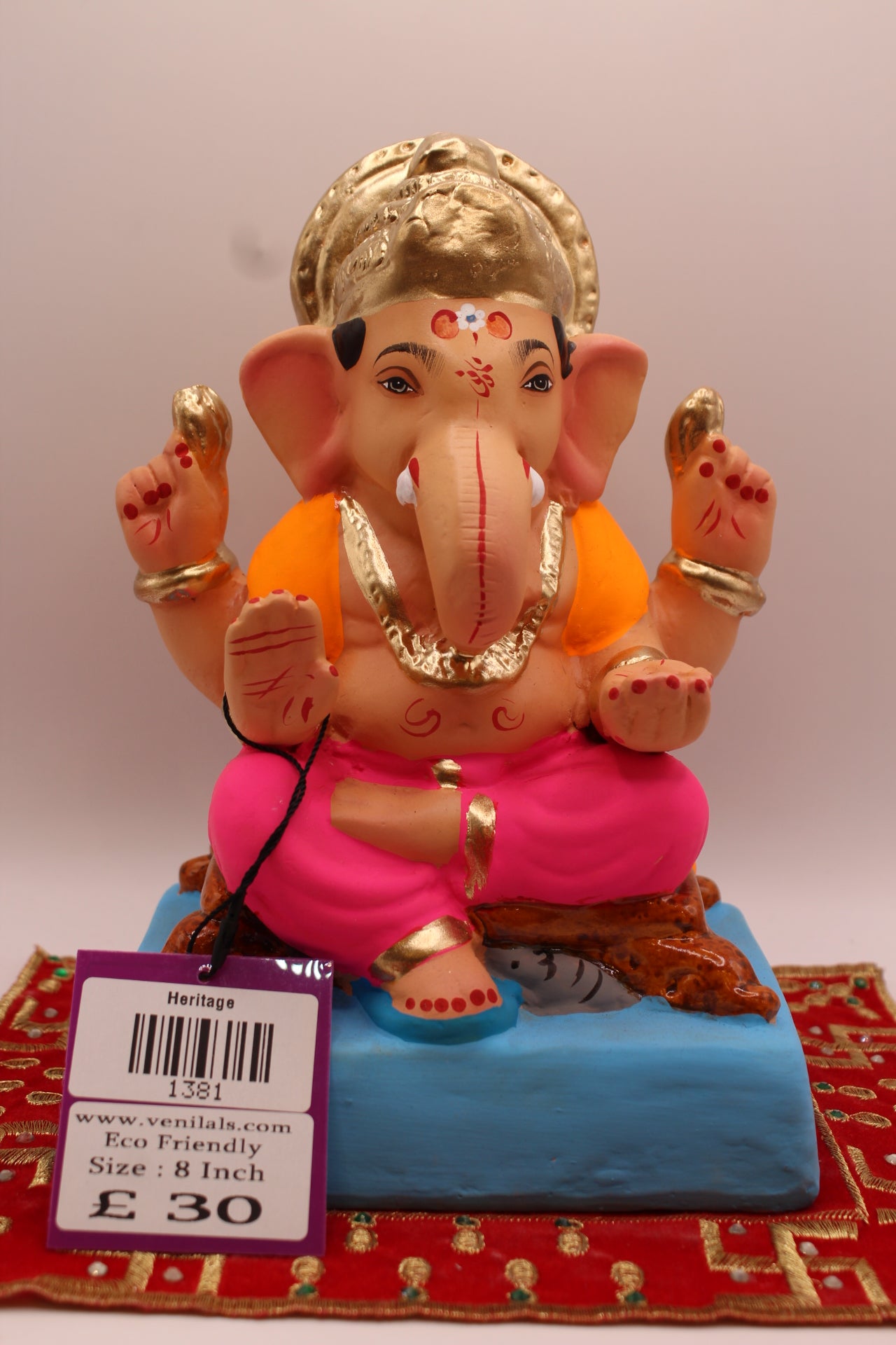 8 inch eco-friendly Ganesh idol – orange khes and rani pink dhoti with blue footrest, front