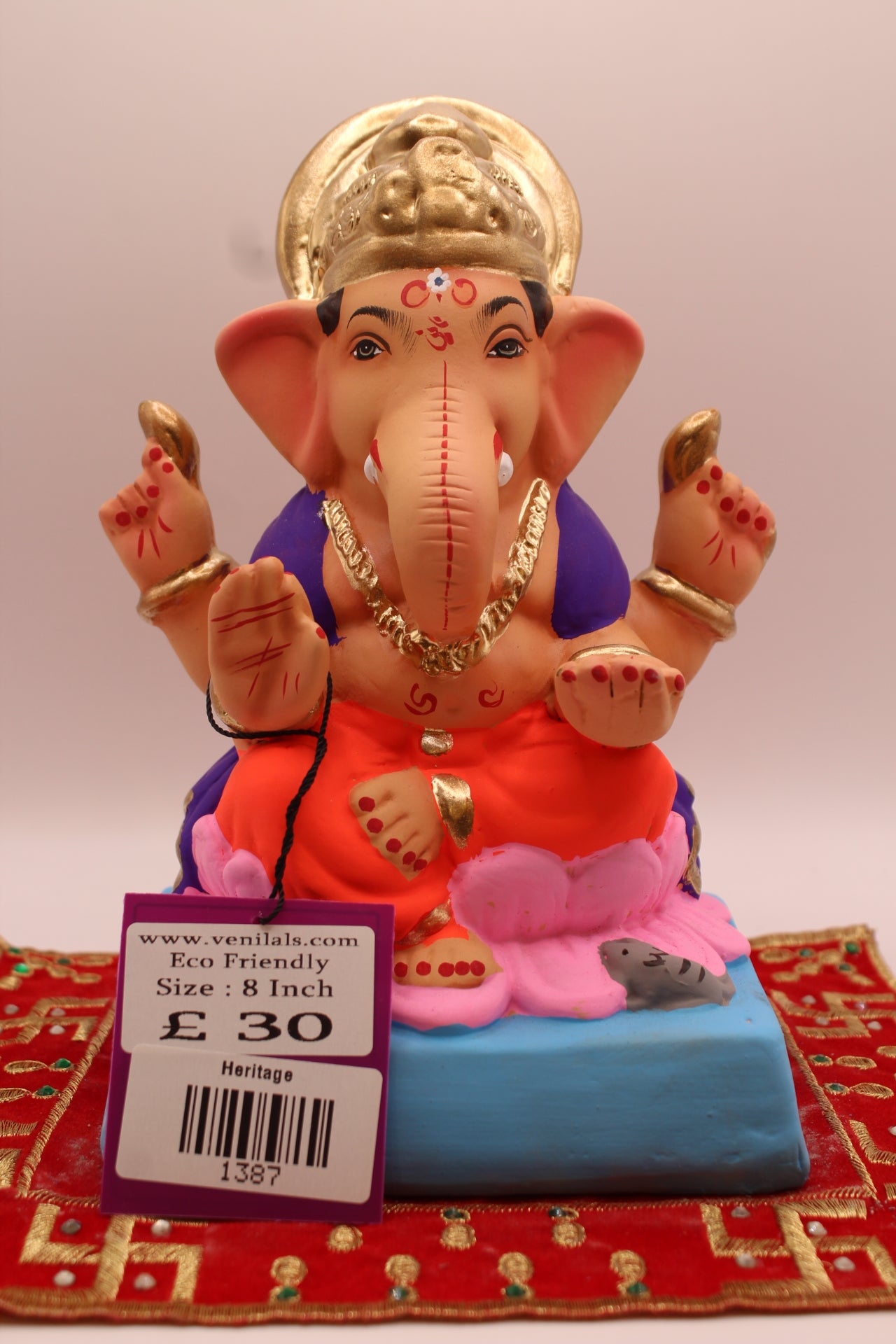 8 inch eco-friendly Ganesh idol – purple khes and orange dhoti on a pink lotus base, front