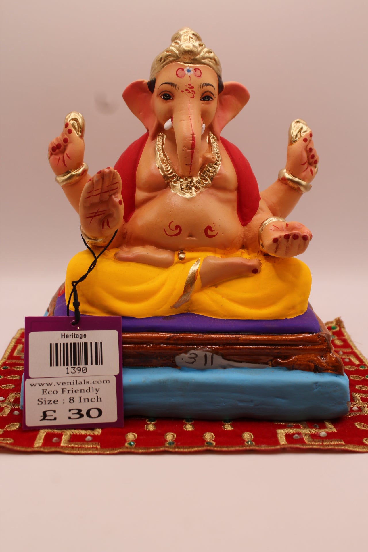 8 inch eco-friendly Ganesh idol – red khes over both shoulders with crested gold mukut, front