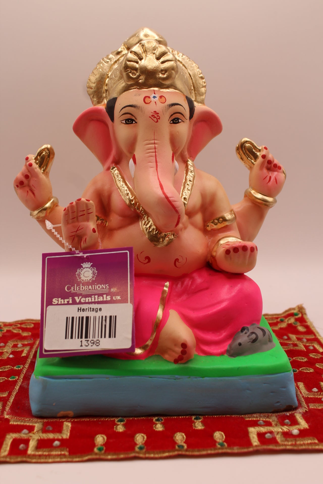 8 inch eco-friendly Ganesh idol – all rani pink outfit with tall carved gold mukut, front