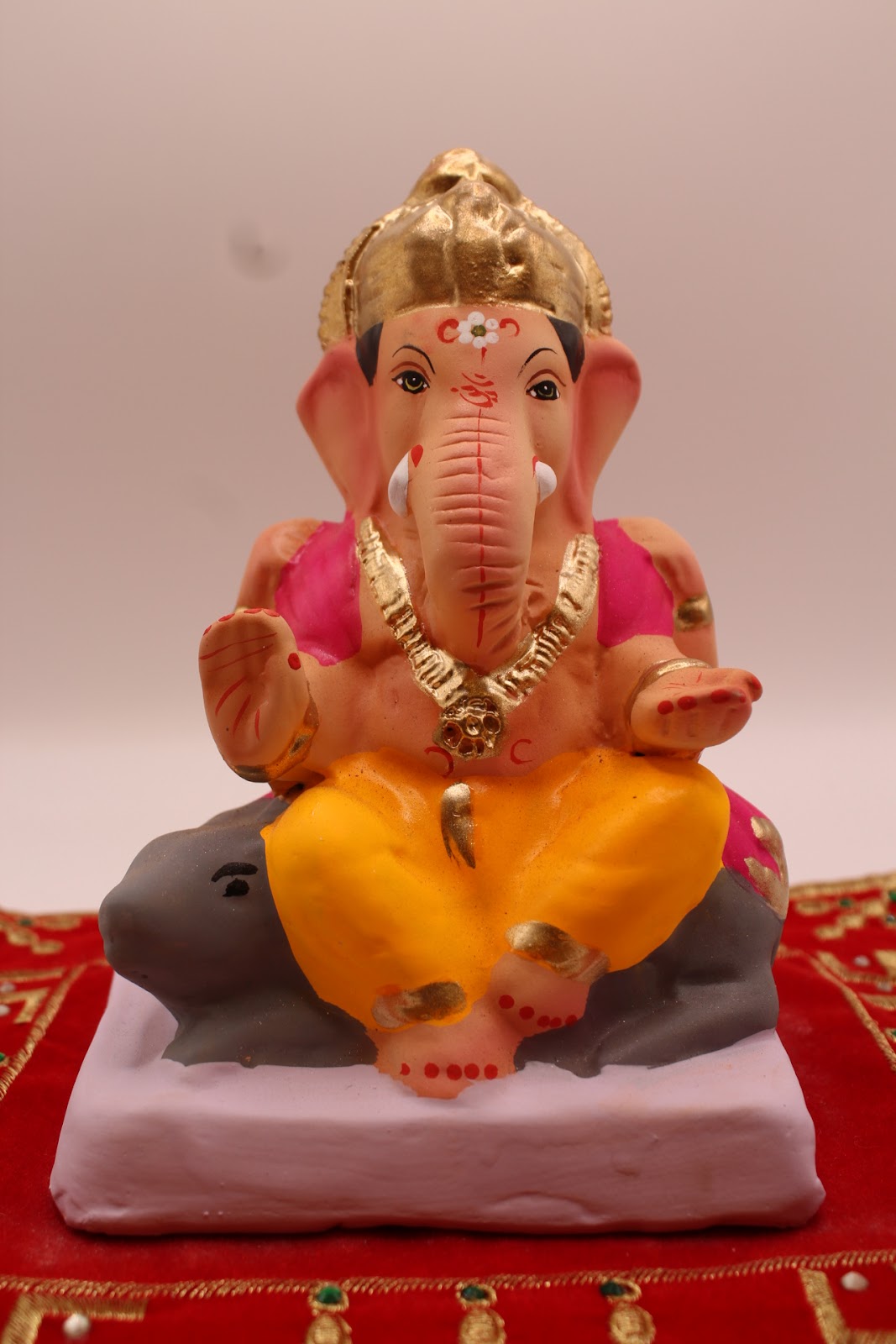 Eco-friendly 6 inch Ganesh idol seated on a mouse, front view