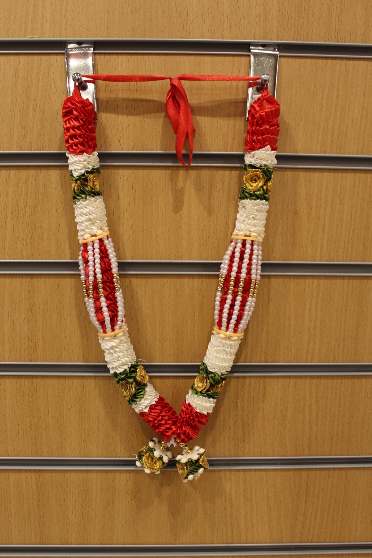 Red and white artificial flower garland mala, hanging