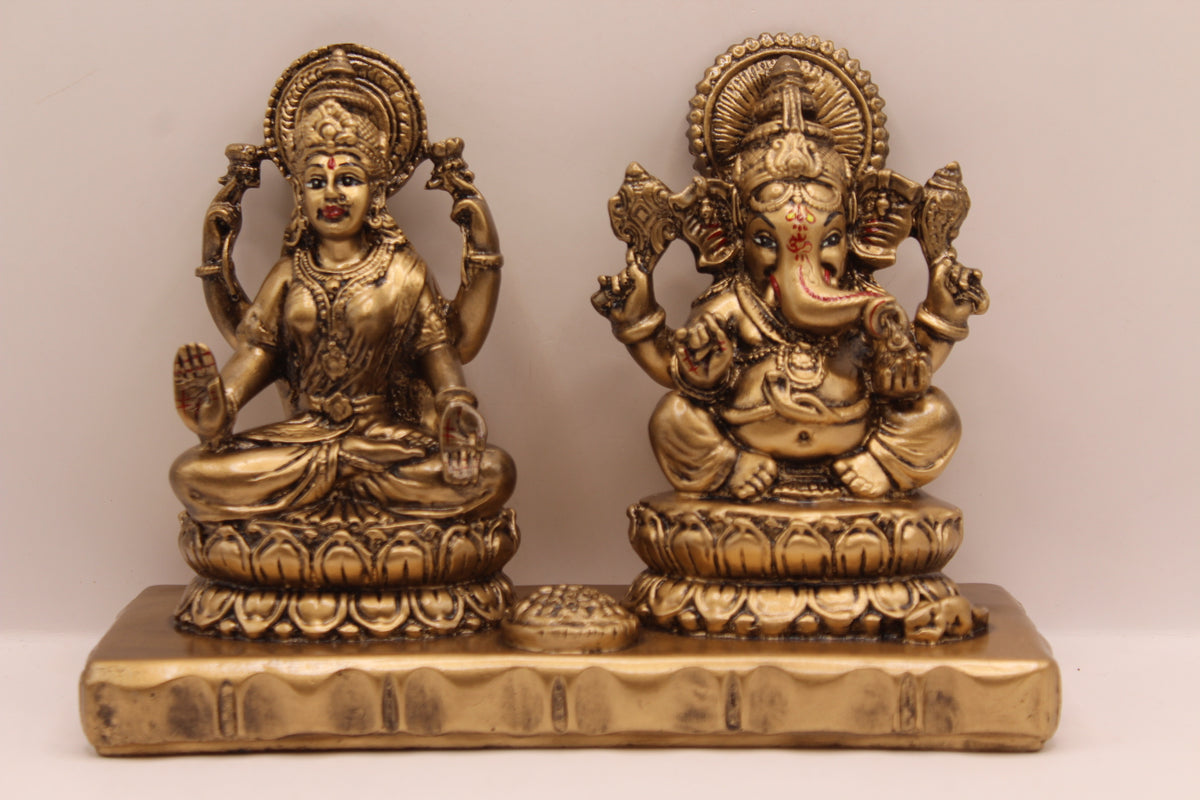 Antique gold Ganesh Laxmi resin murti pair, front view