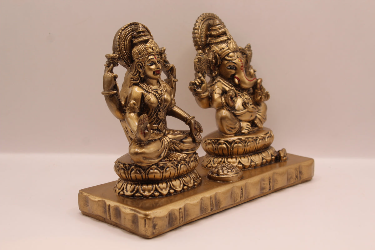 Antique gold Ganesh Laxmi resin murti pair, left side view